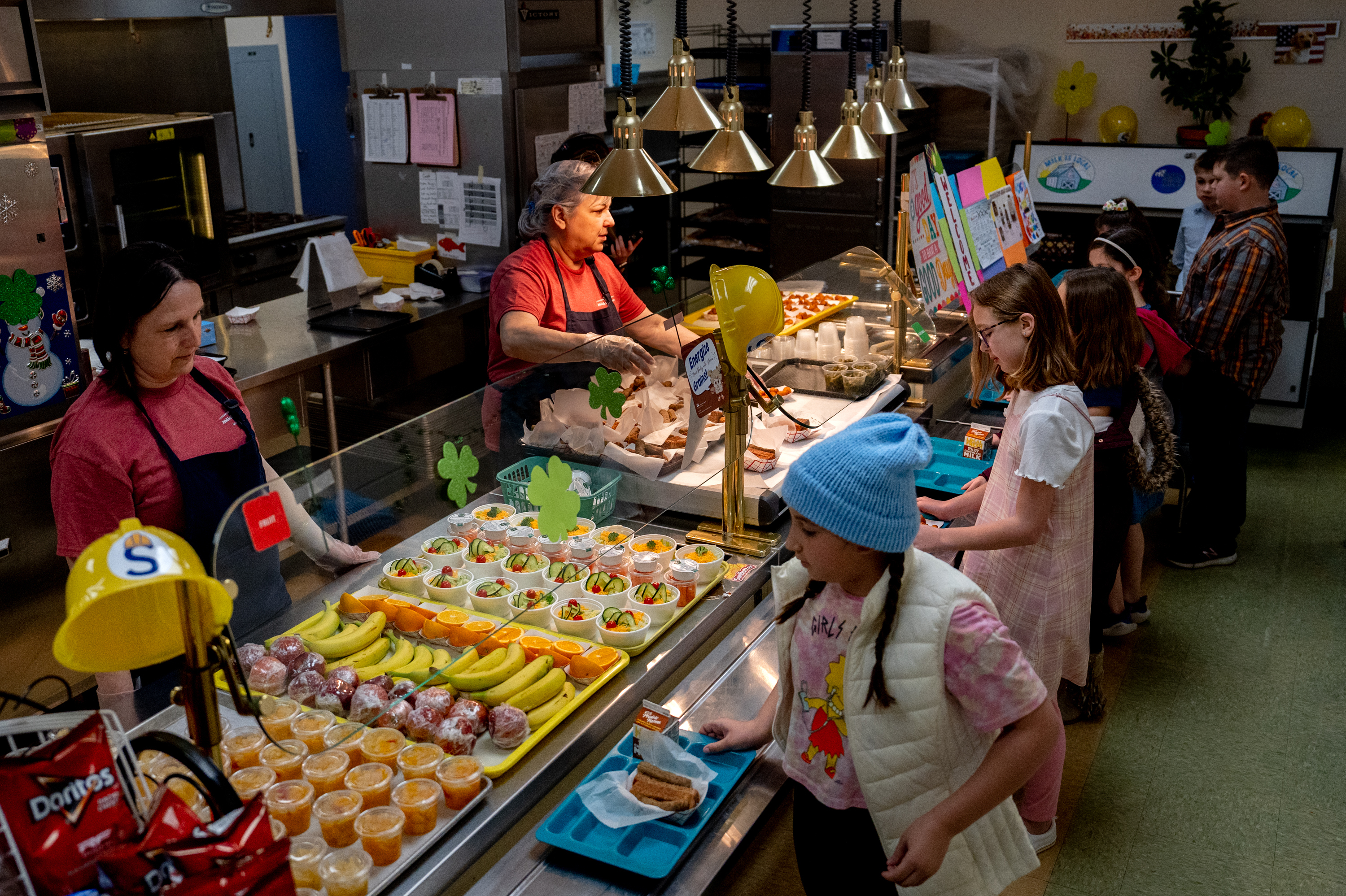Oakville Elementary School students go through the lunch line on Wednesday, March 8, 2023, in Oakville, Mo. (Brian Munoz/St. Louis Public Radio)