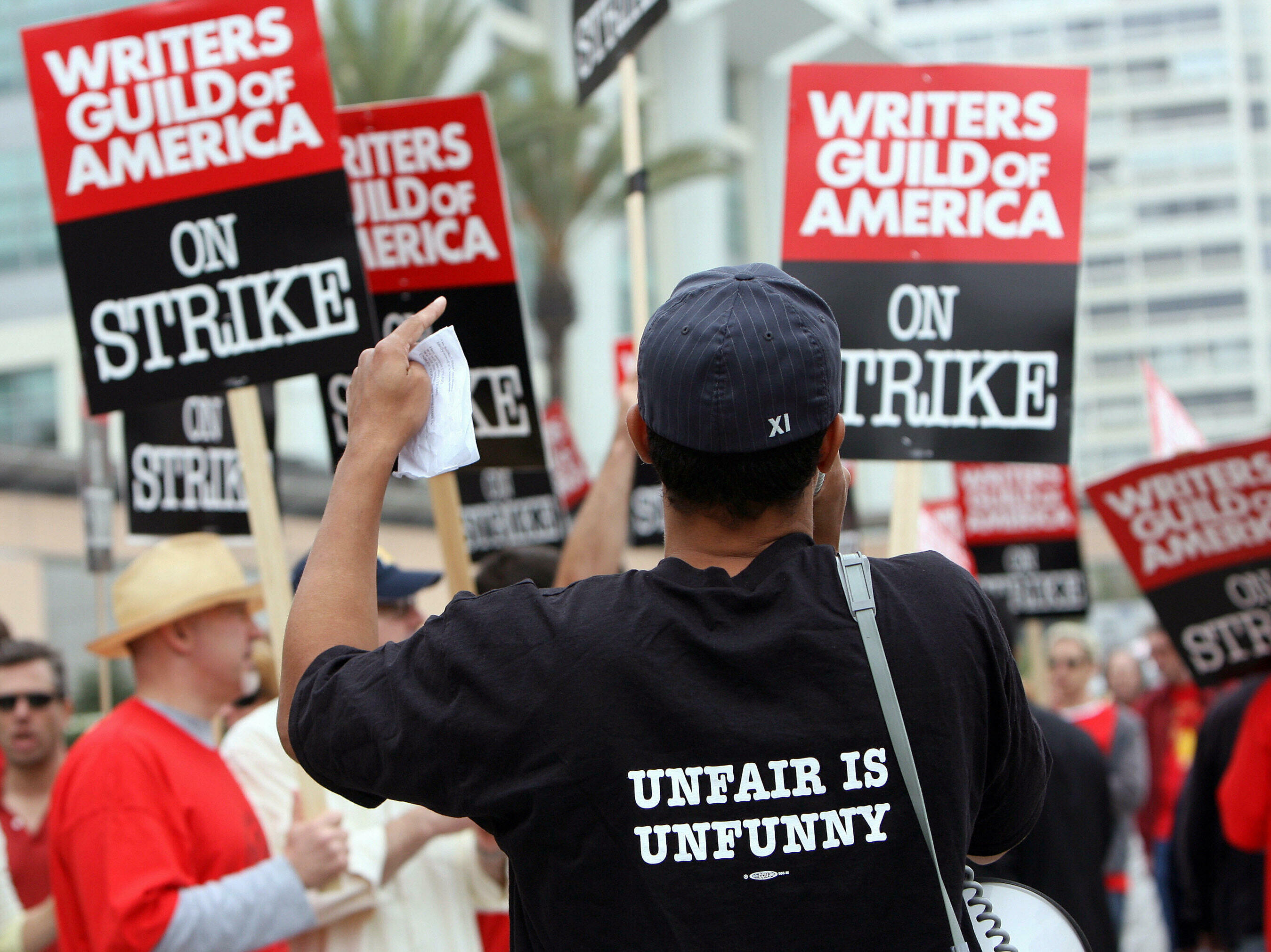 The Writers Guild of America is on strike, in its first work stoppage since 2007-2008. In that strike, writers demonstrated in front of the Fox studio in Los Angeles. (AFP via Getty Images)