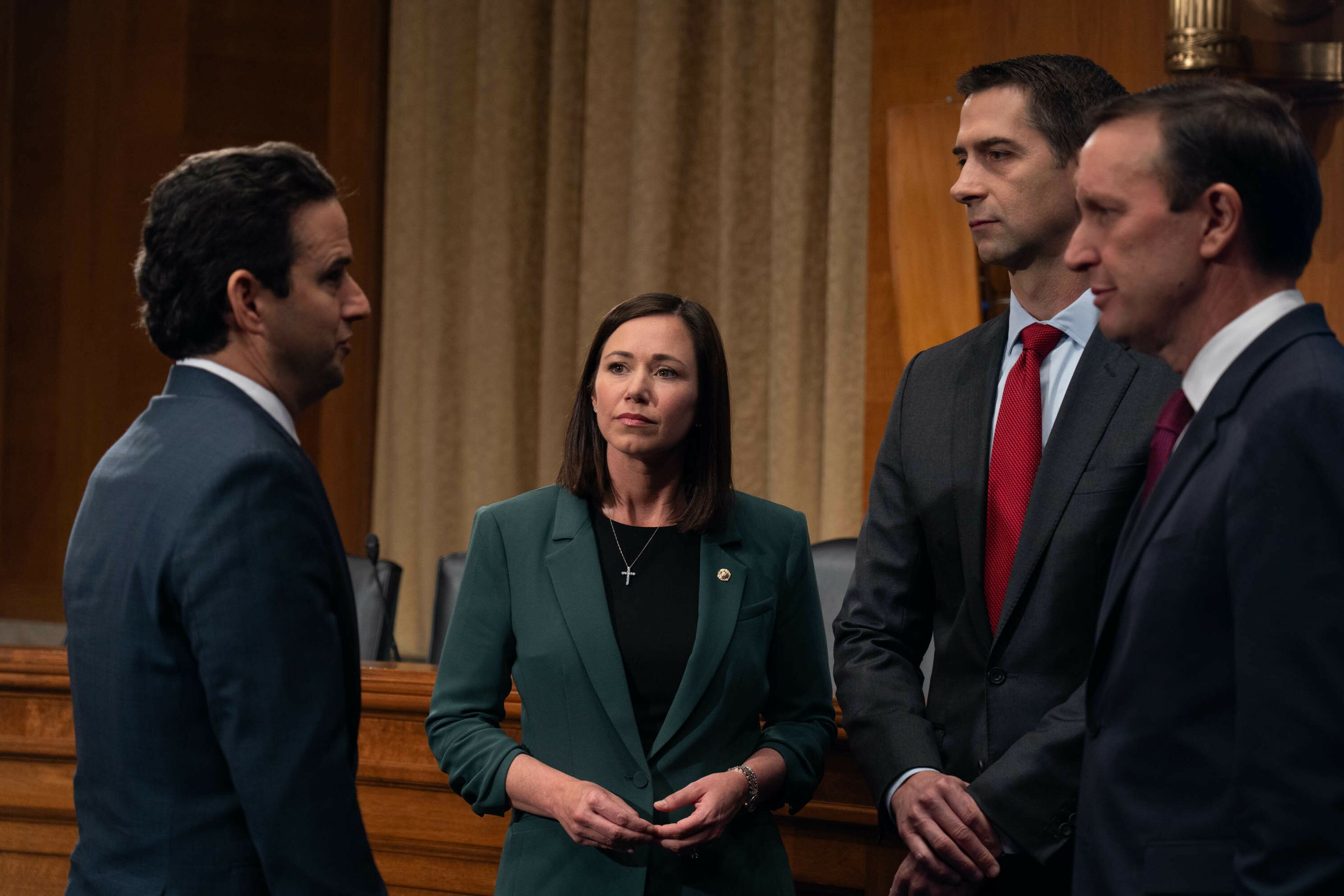 Sen. Brian Schatz, D-Hawaii,  Sen. Katie Britt, R- Ala., Sen, Tom Cotton, R-Ark., and Sen, Chris Murphy, D-Conn. are pushing a new bipartisan bill focused on online safety for kids. (Keren Carrión/NPR)
