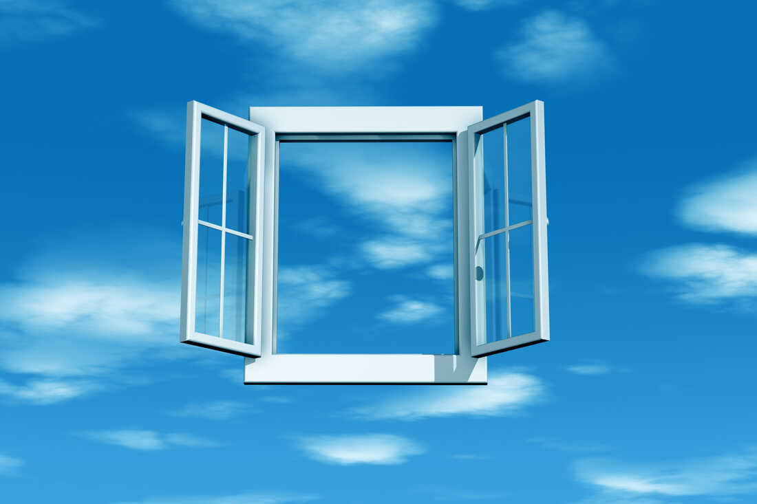 Studio photograph showing white open window with blue sky and clouds. Ventilation is one tip that can improve indoor air quality.