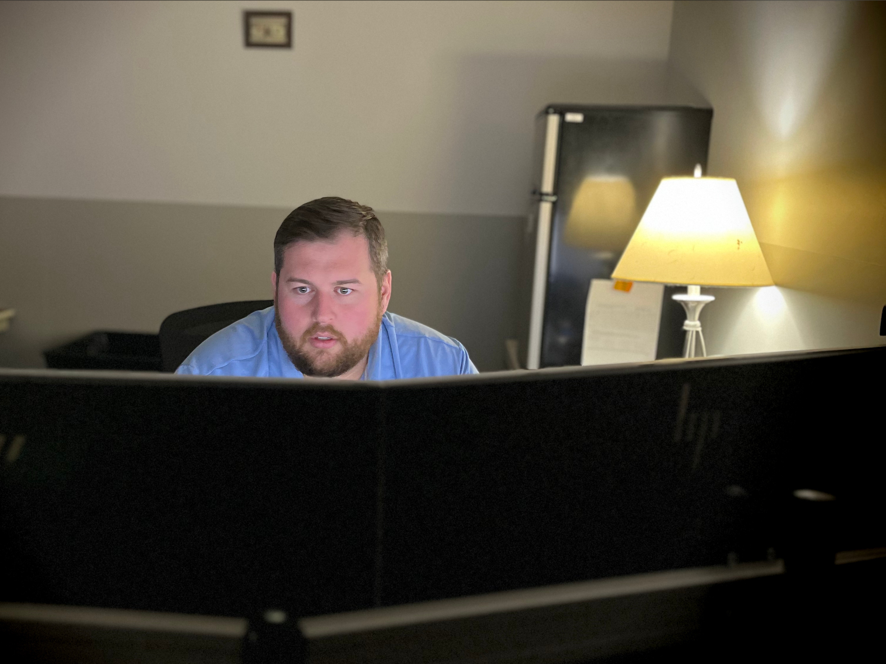 Matt Ashley, a senior technologist at Johnson Memorial Health in Franklin, Indiana, is part of a small IT team that spent months helping the hospital recover after a crippling cyberattack in 2021. (Farah Yousry/WFYI)