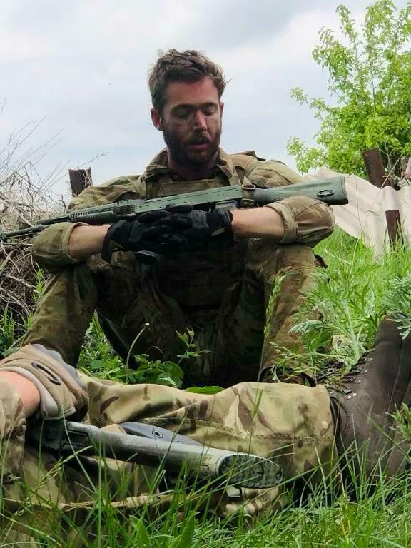 Ukraine buries a 'brave son' from America 1 In this photo from the Campbell family, Christopher Campbell is seen on the front line of the war.