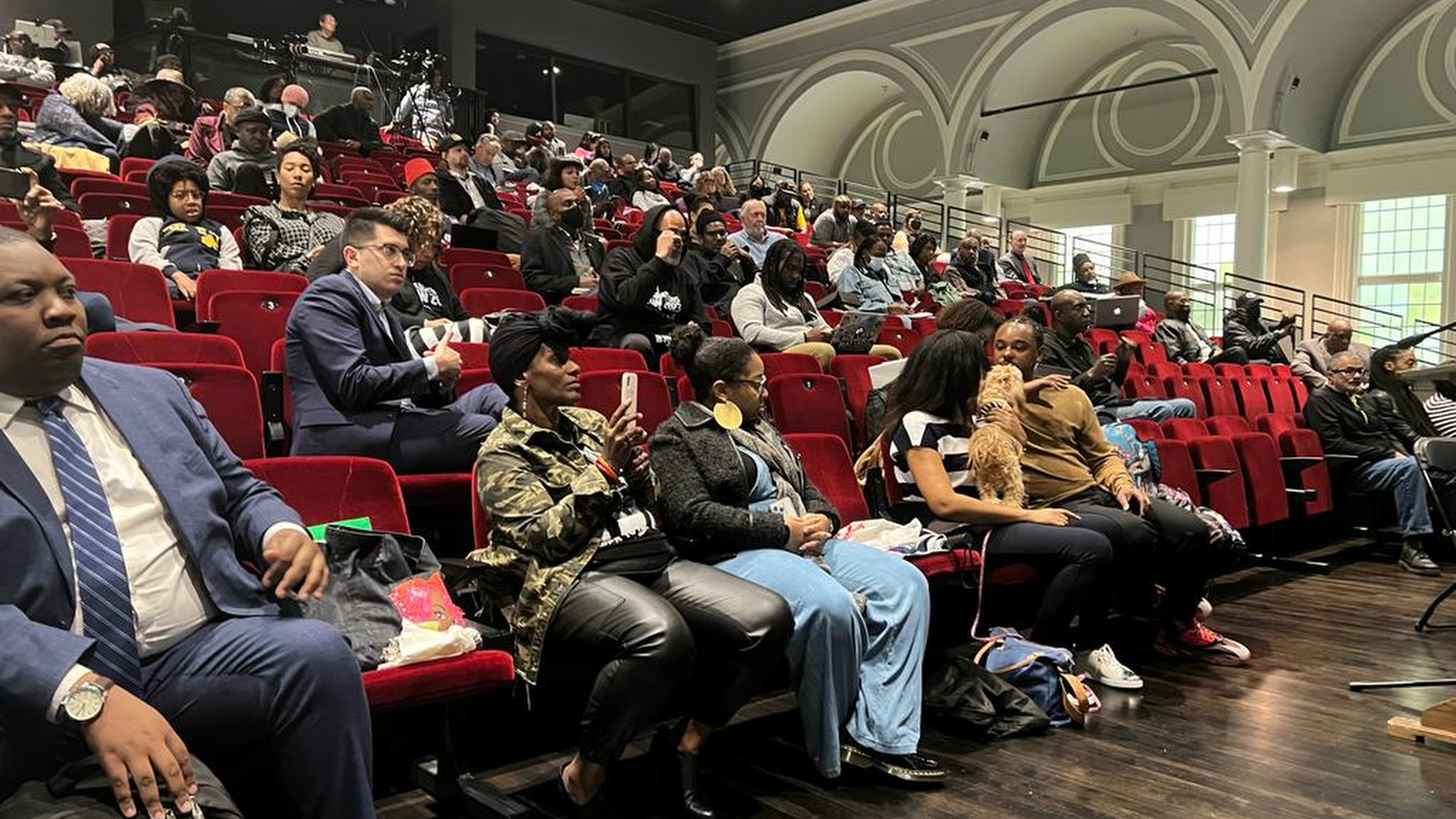 People listen to the California reparations task force, a nine-member committee studying restitution proposals for African Americans, at a meeting at Lesser Hall in Mills College at Northeastern University in Oakland, Calif., on Saturday, May 6, 2023.