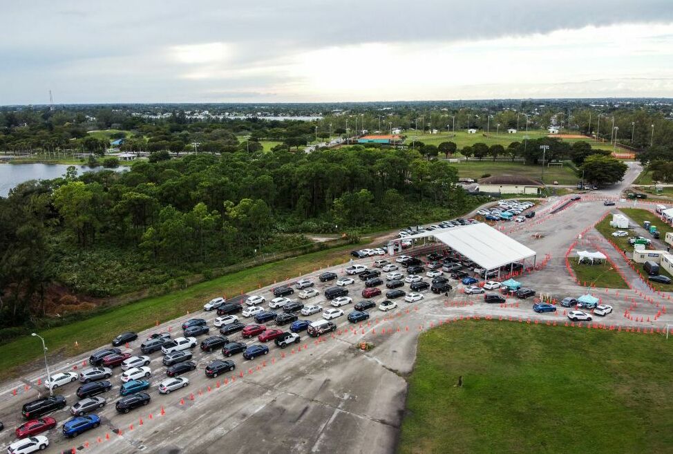 Cars line up at a COVID-19 testing site at Tropical Park in Miami, Florida on December 21, 2021, during the omicron surge. Thanks to the public health emergency, COVID testing was free during the major surges of the pandemic.