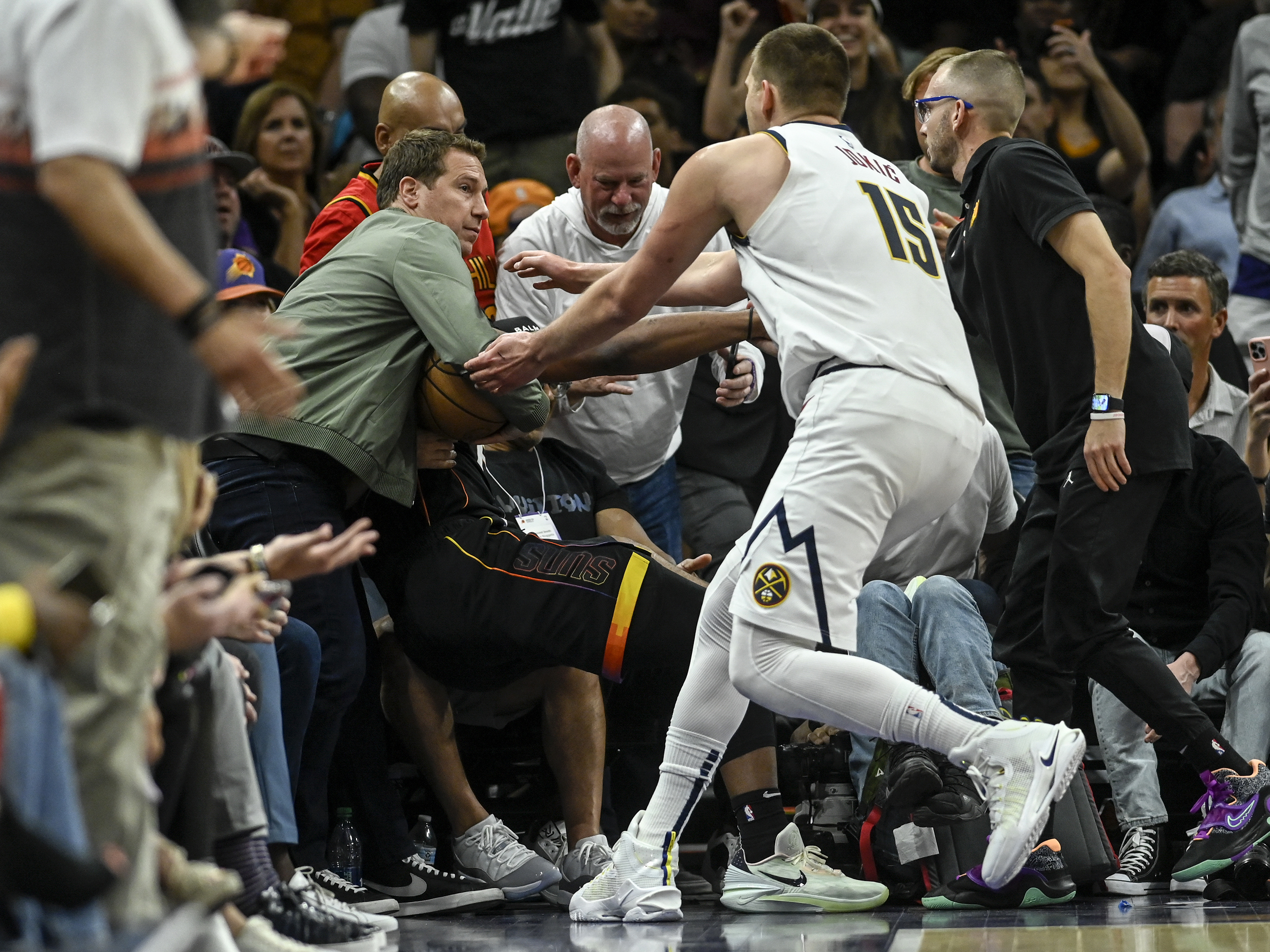 Nikola Jokic during the altercation with Mat Ishbia on Sunday night. (The Denver Post via Getty)