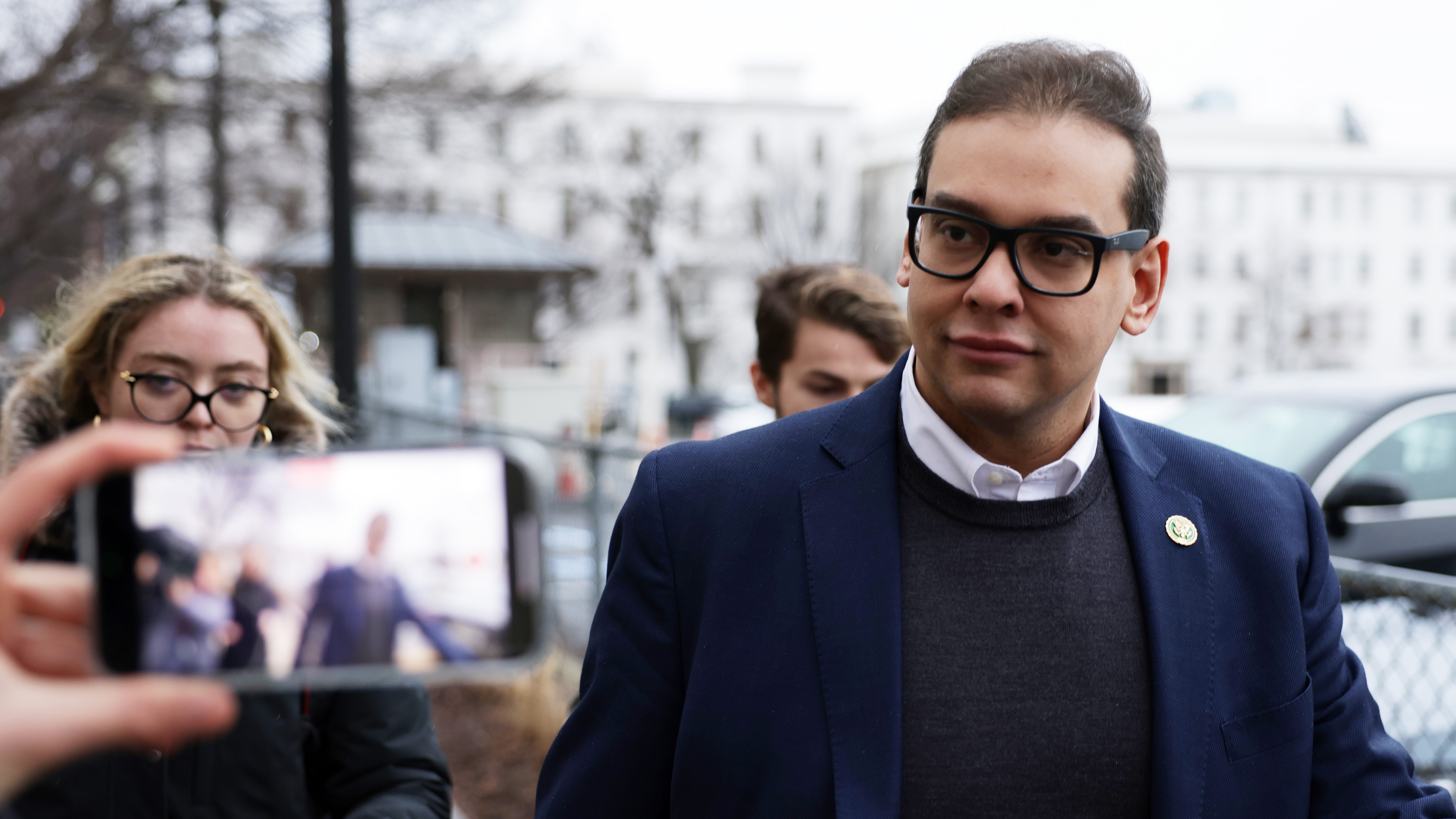 NY Rep Santos surrenders on federal fraud charges