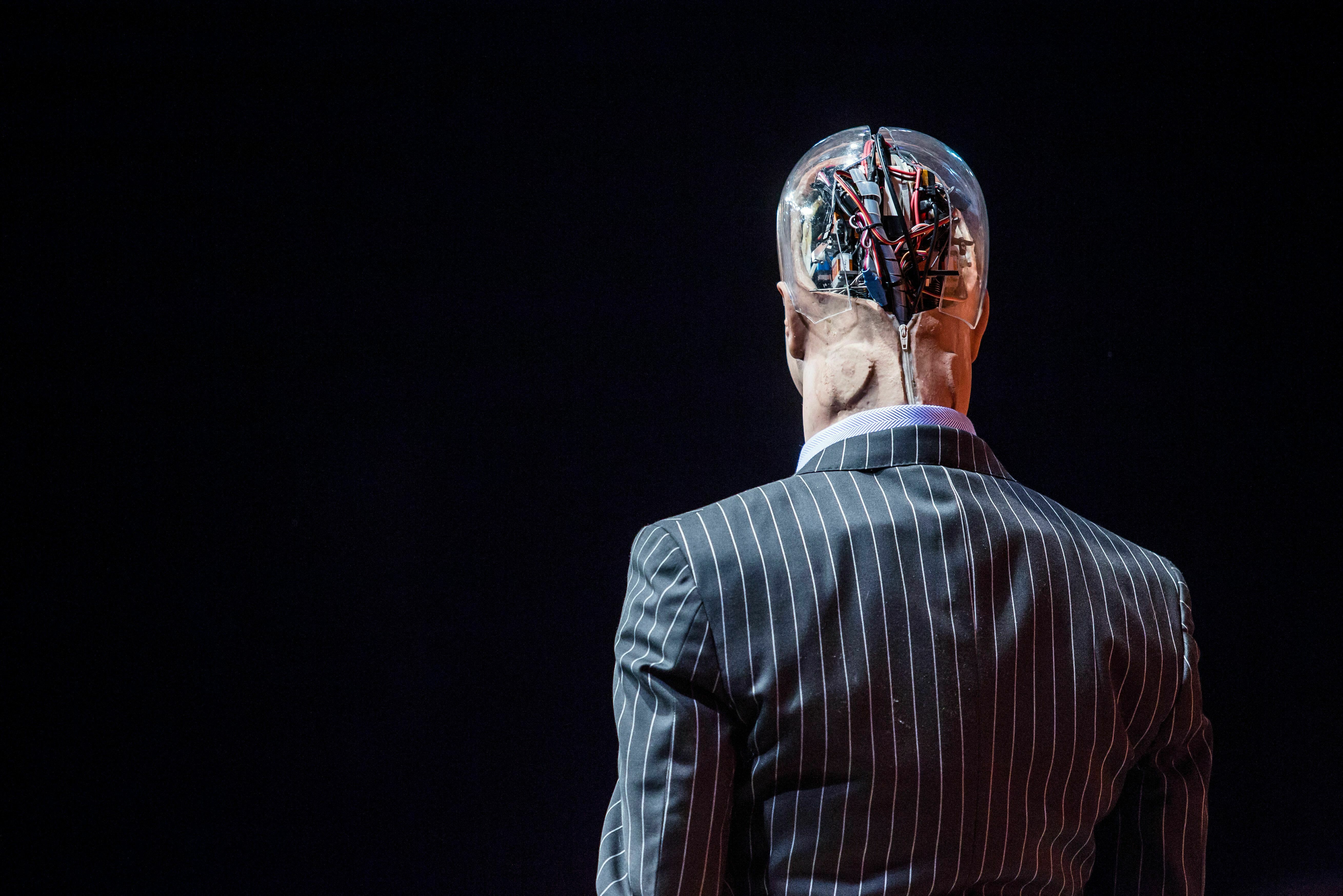 Robot business man go brrrr. (AFP via Getty Images)