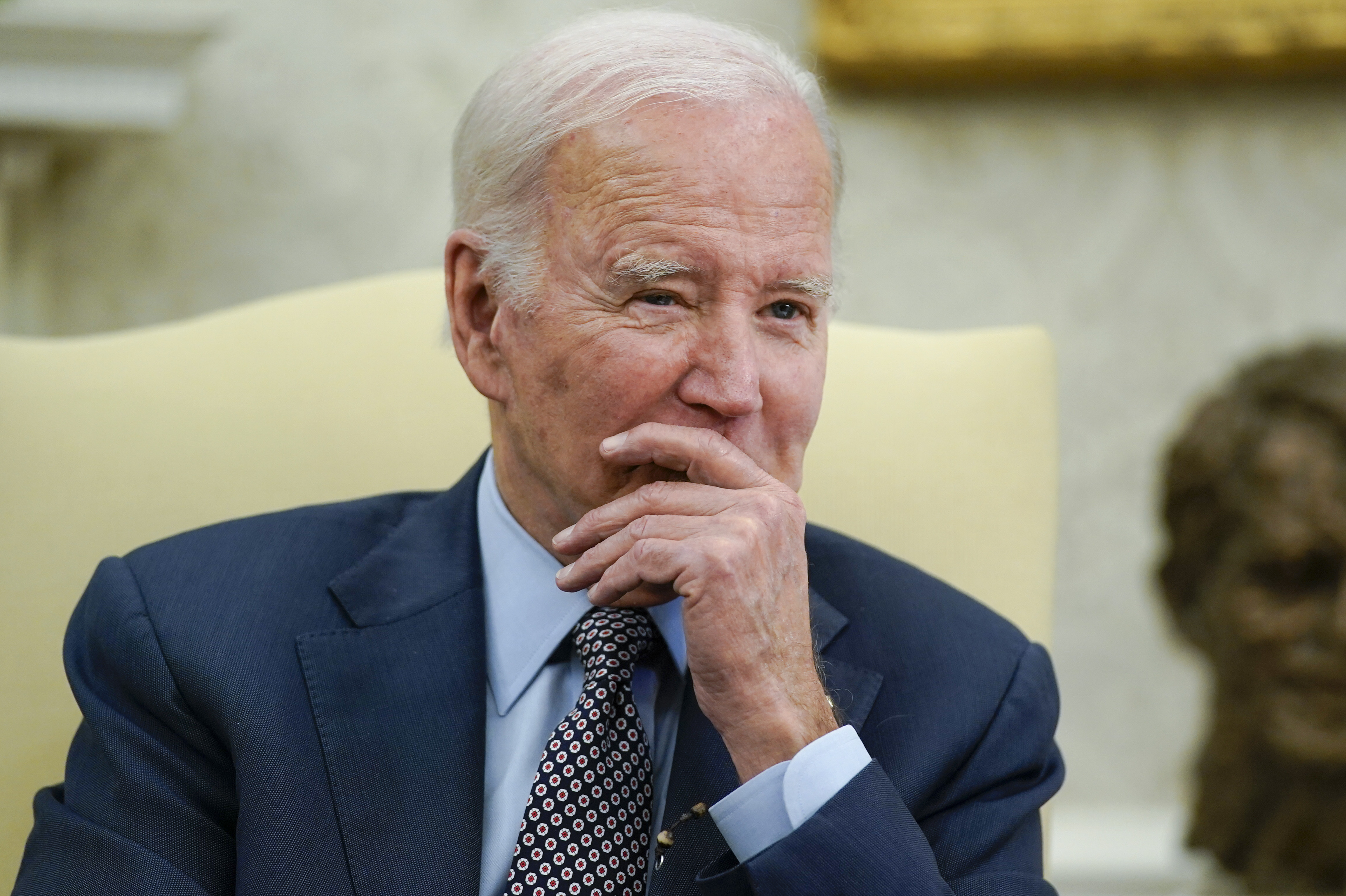 President Joe Biden listens as he meets with House Speaker Kevin McCarthy of Calif., to discuss the debt limit in the Oval Office of the White House, Monday, May 22, 2023, in Washington.