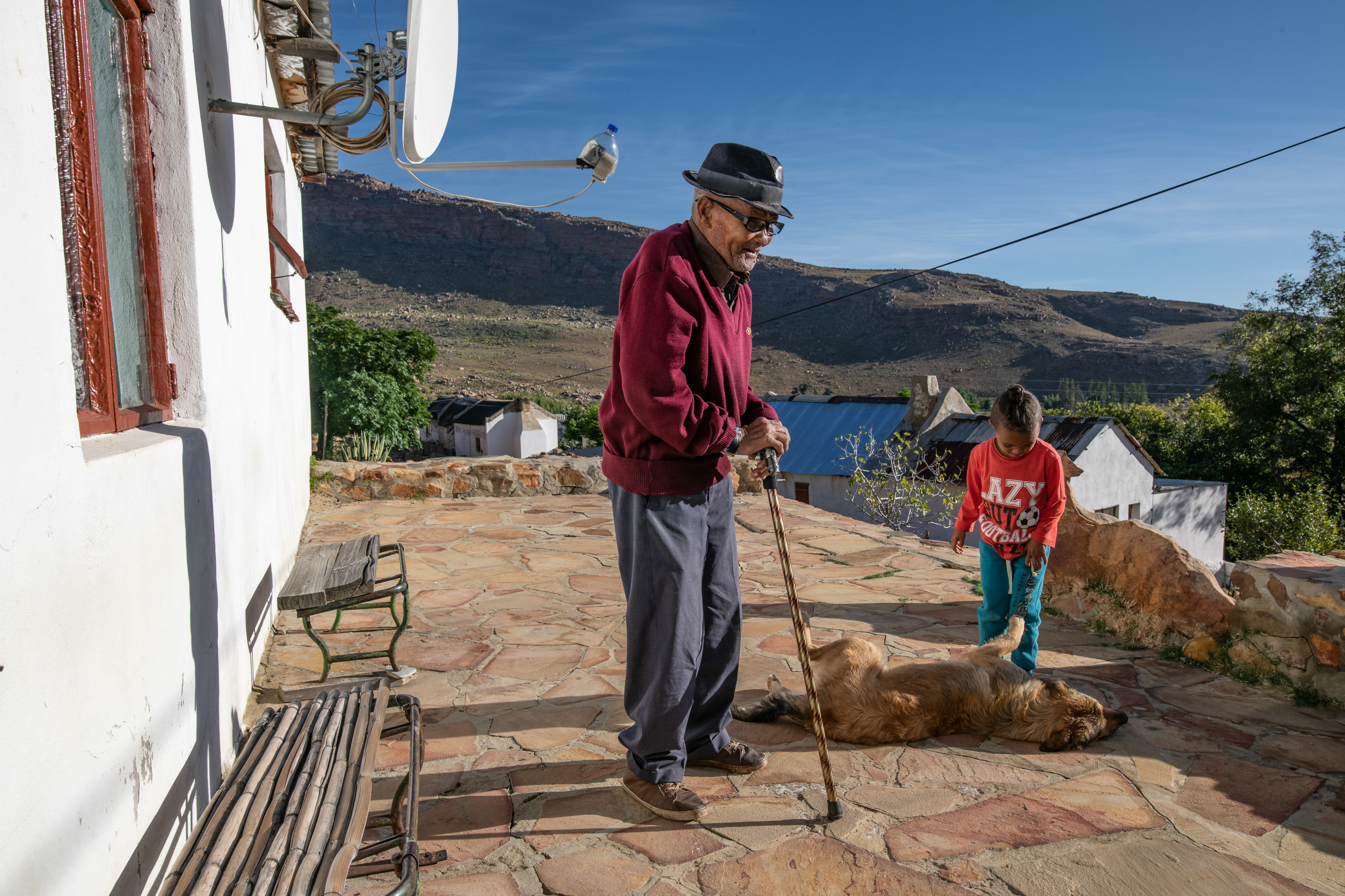 Trendy rooibos tea finally brings revenues to Indigenous South African farmers 10 Oom Kosie Salomo, 89, an Indigenous Khoisan rooibos farmer and one of the first people in the area to start cultivating the crop, photographed on the porch of his home with his great grandson in the village of Langkloof, South Africa.