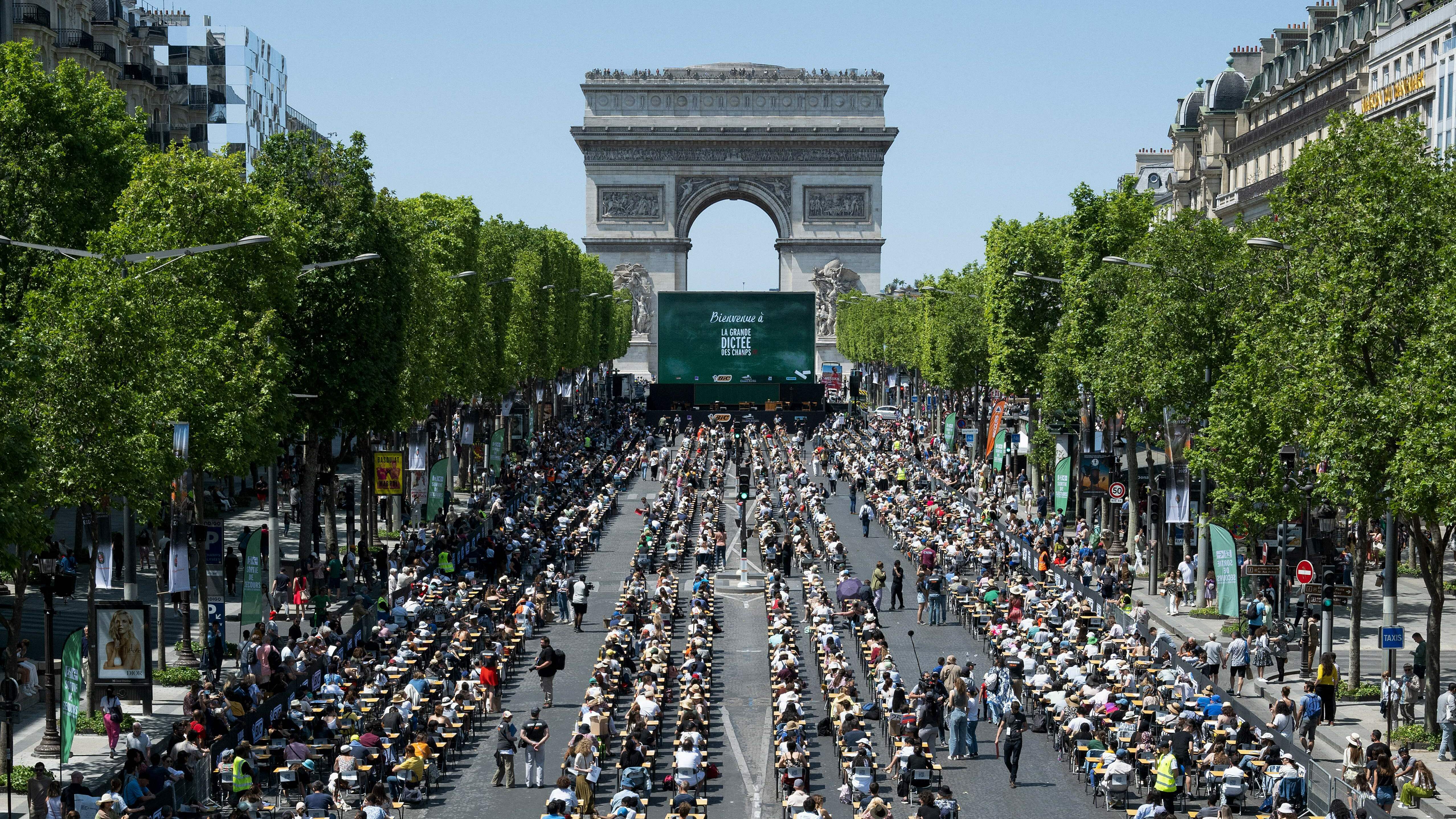 A massive dictation event takes over the iconic Champs-Élysées in Paris A massive dictation event takes over the iconic Champs-Élysées in Paris