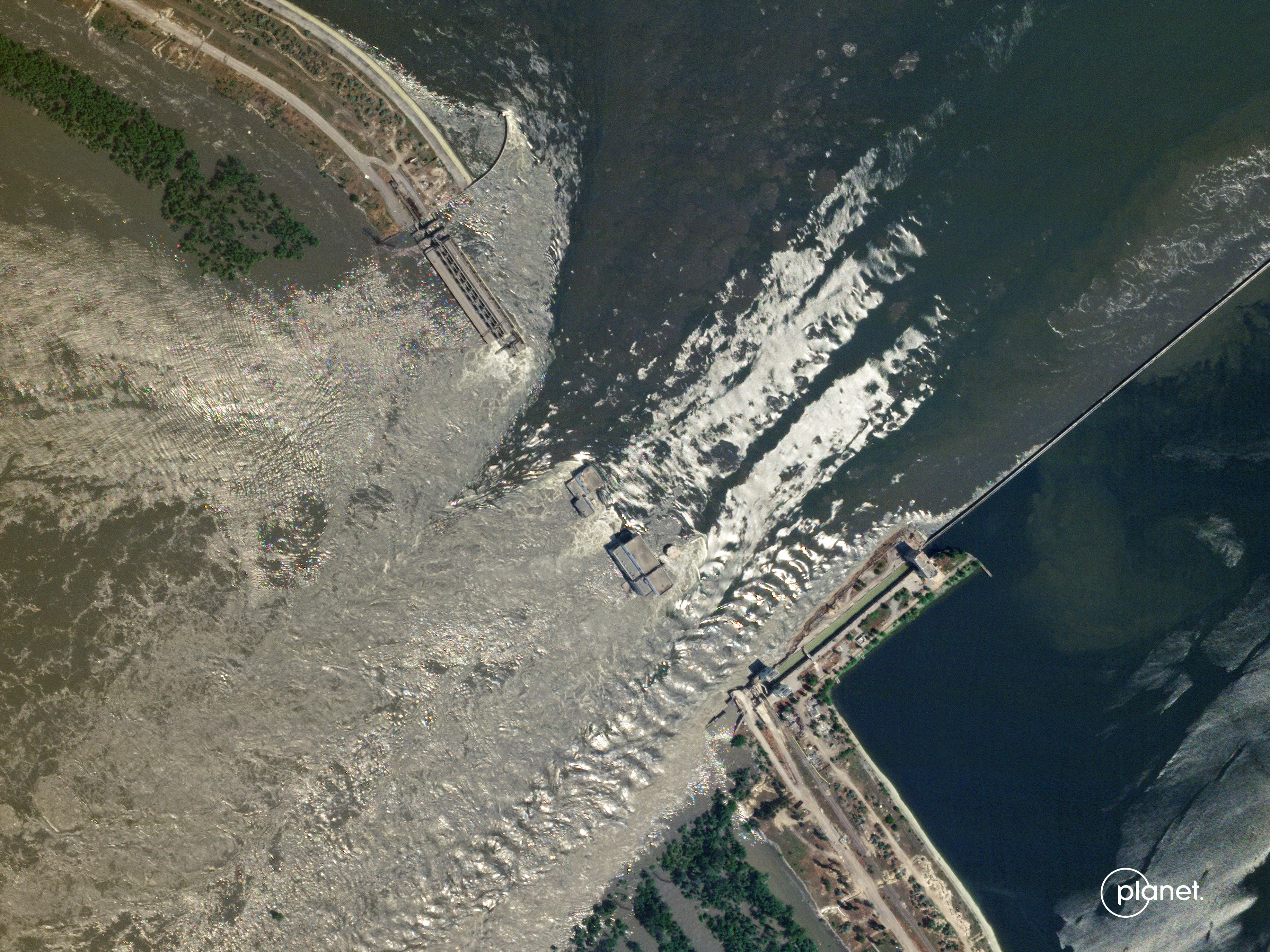 The Kakhovka dam on the Dnipro River in southern Ukraine suffered a catastrophic breach overnight, in what Ukrainian officials say was an attack by Russia. (Planet Labs PBC)