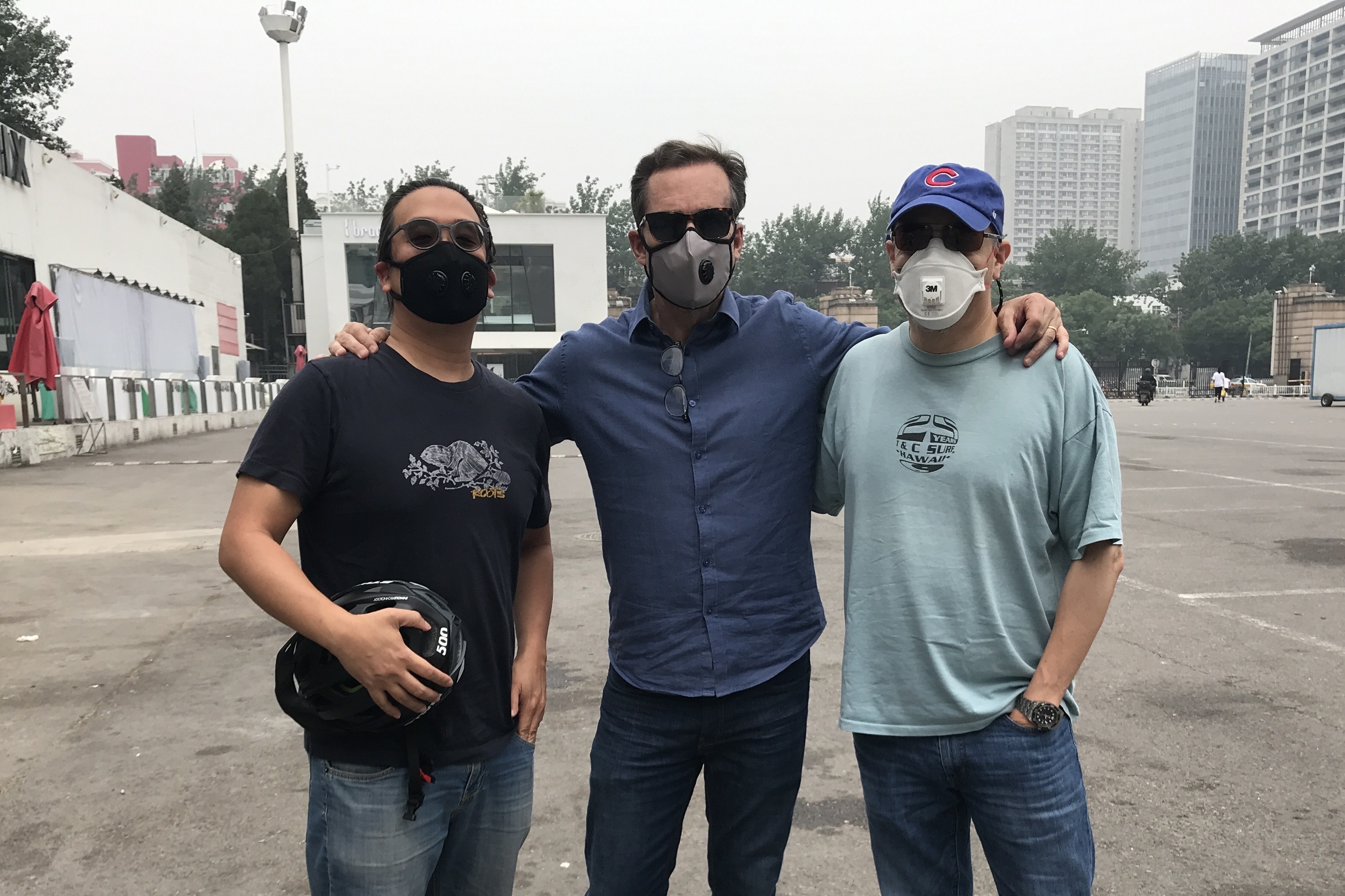 Here's how NPR reporters around the world are dealing with air pollution 1 NPR's Anthony Kuhn (right), with Bob Woodruff (middle) and Karson Yiu (left), both of ABC News, at Beijing Workers' Stadium in May 2018.