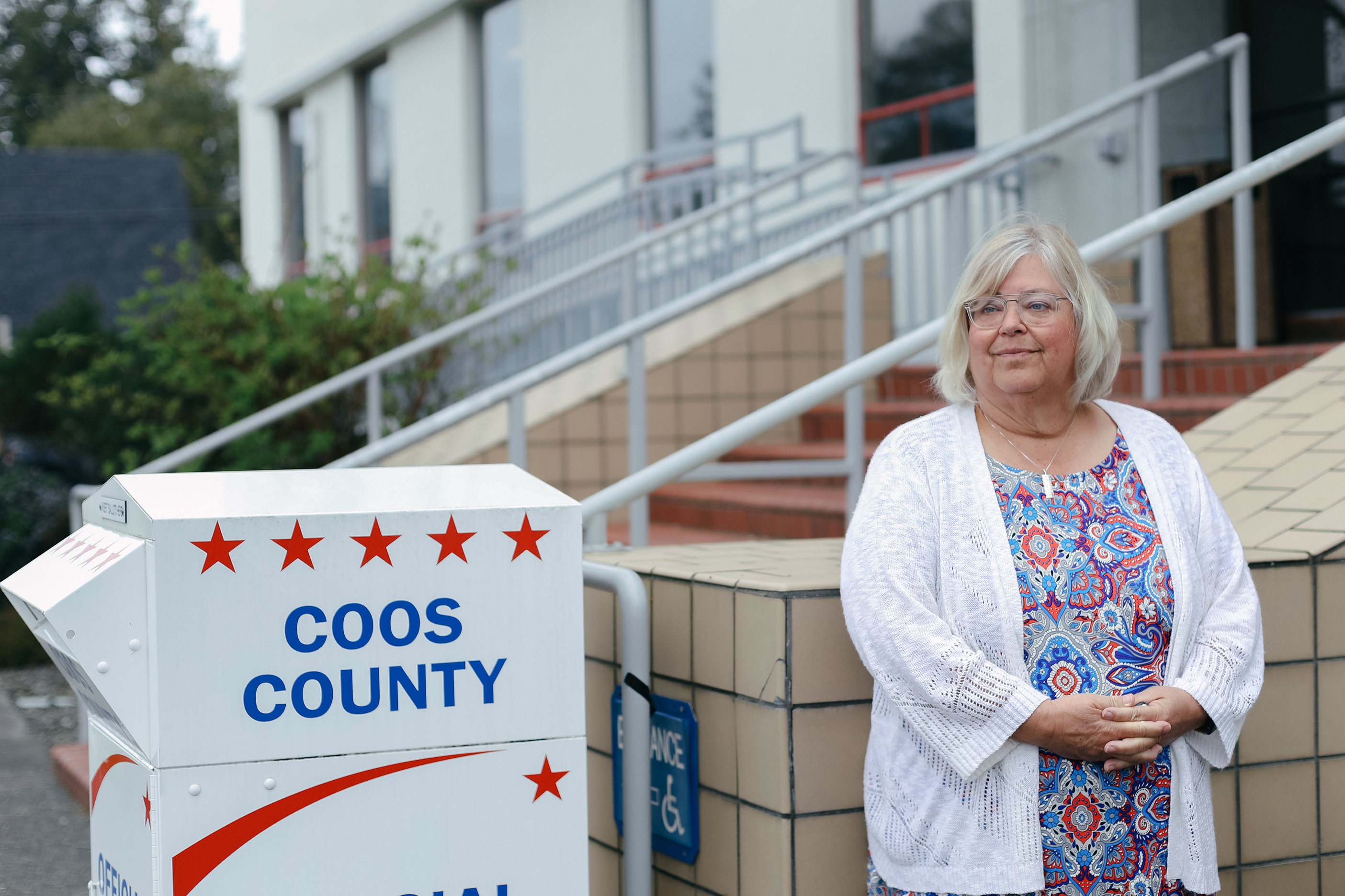 Dede Murphy and other local election workers say members of an election denier group camped out in the hallways of their county building and yelled in their faces. Some say they were followed home or put in physical danger. Election workers across 22 states tell NPR they've received threats or felt unsafe doing their jobs. (Wesley Lapointe for NPR)
