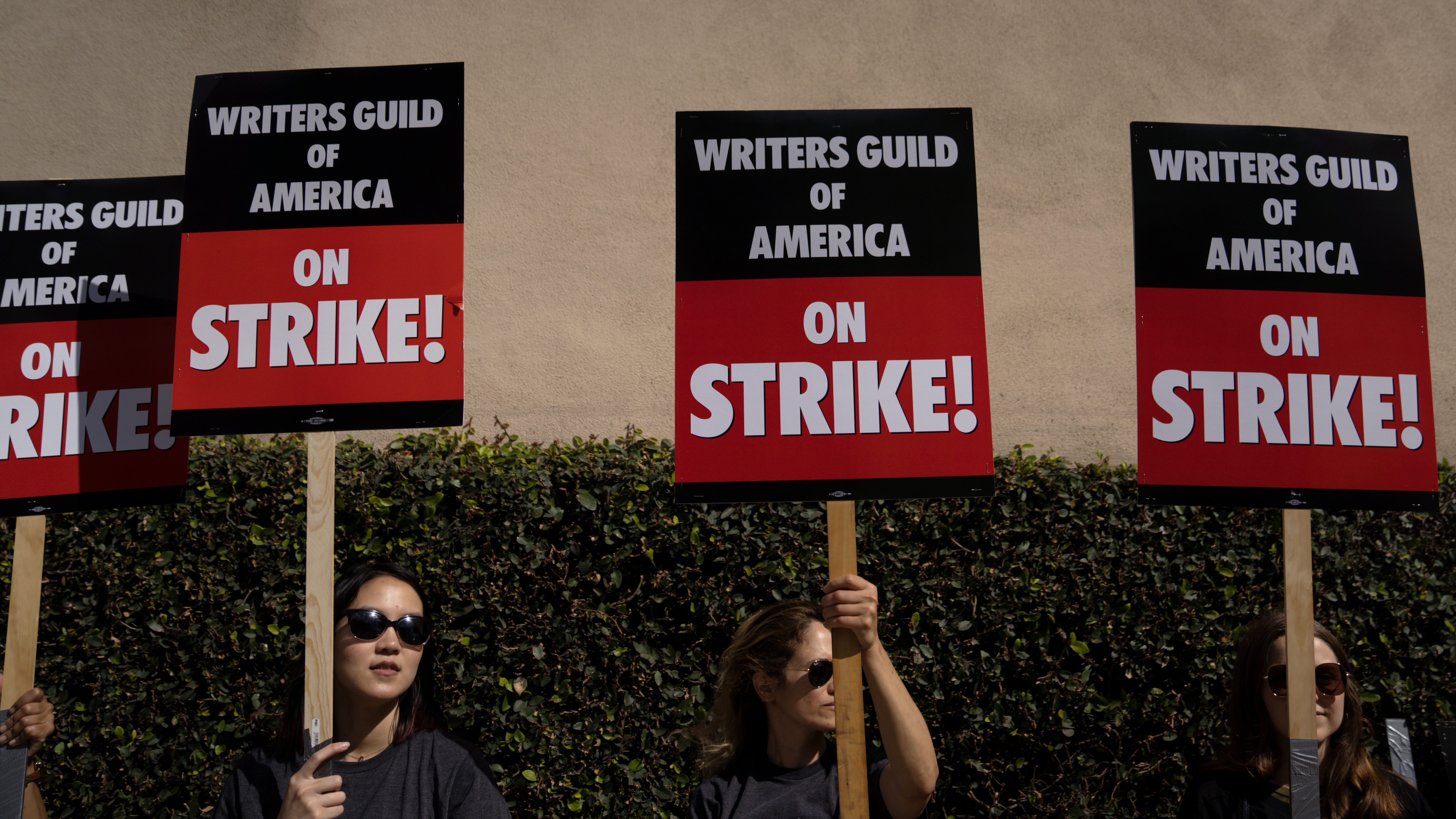 Screenwriters around the world are organizing pickets and other actions on June 14 in support of the ongoing Writers Guide of America strike. Above, Writers Guild of America workers picket outside the Warner Brother studios, on May 2, 2023 in Burbank, Calif. (Getty Images)