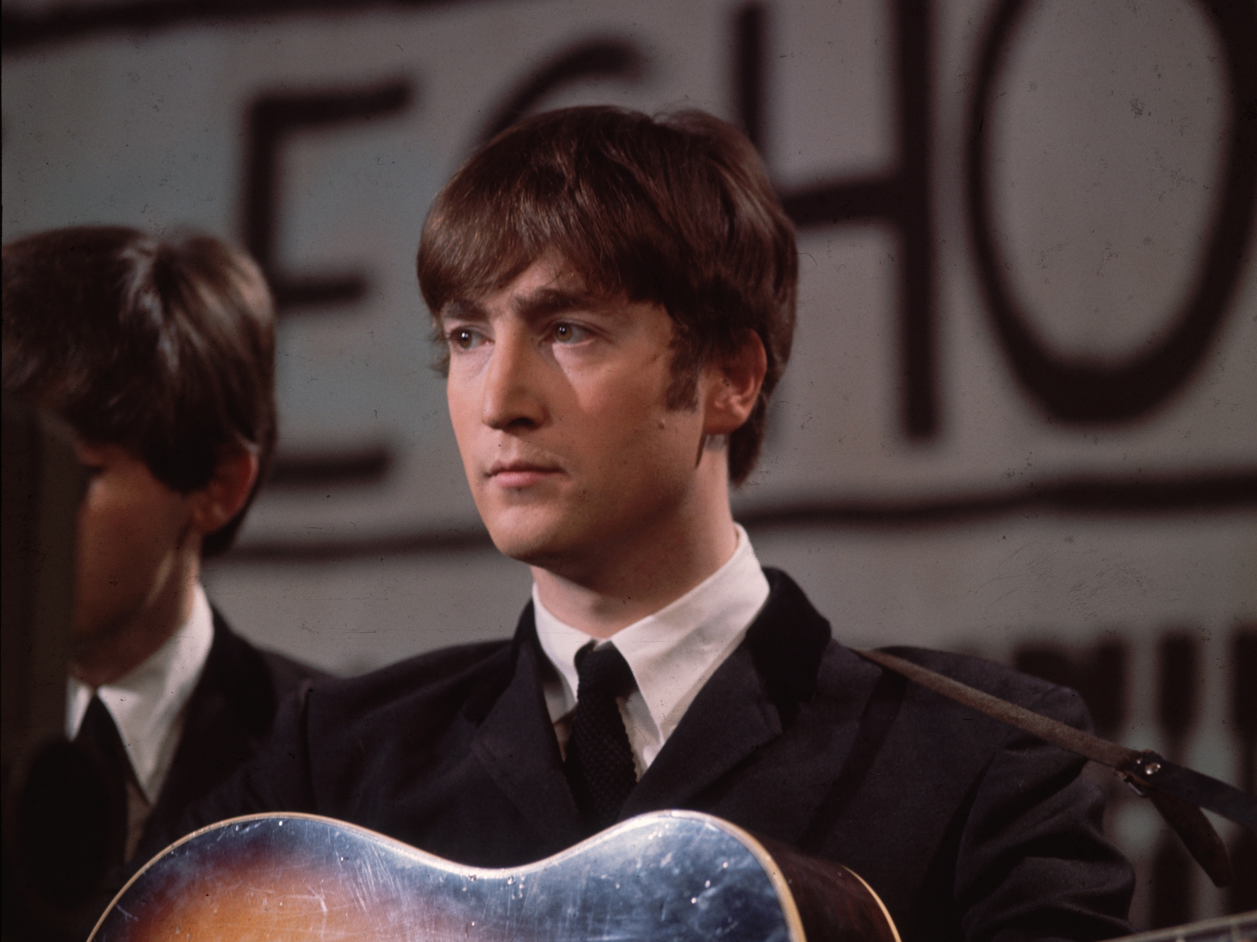 The voice of John Lennon, seen here in 1963, will appear on The Beatles' new record, says his former bandmate Paul McCartney. (Getty Images)