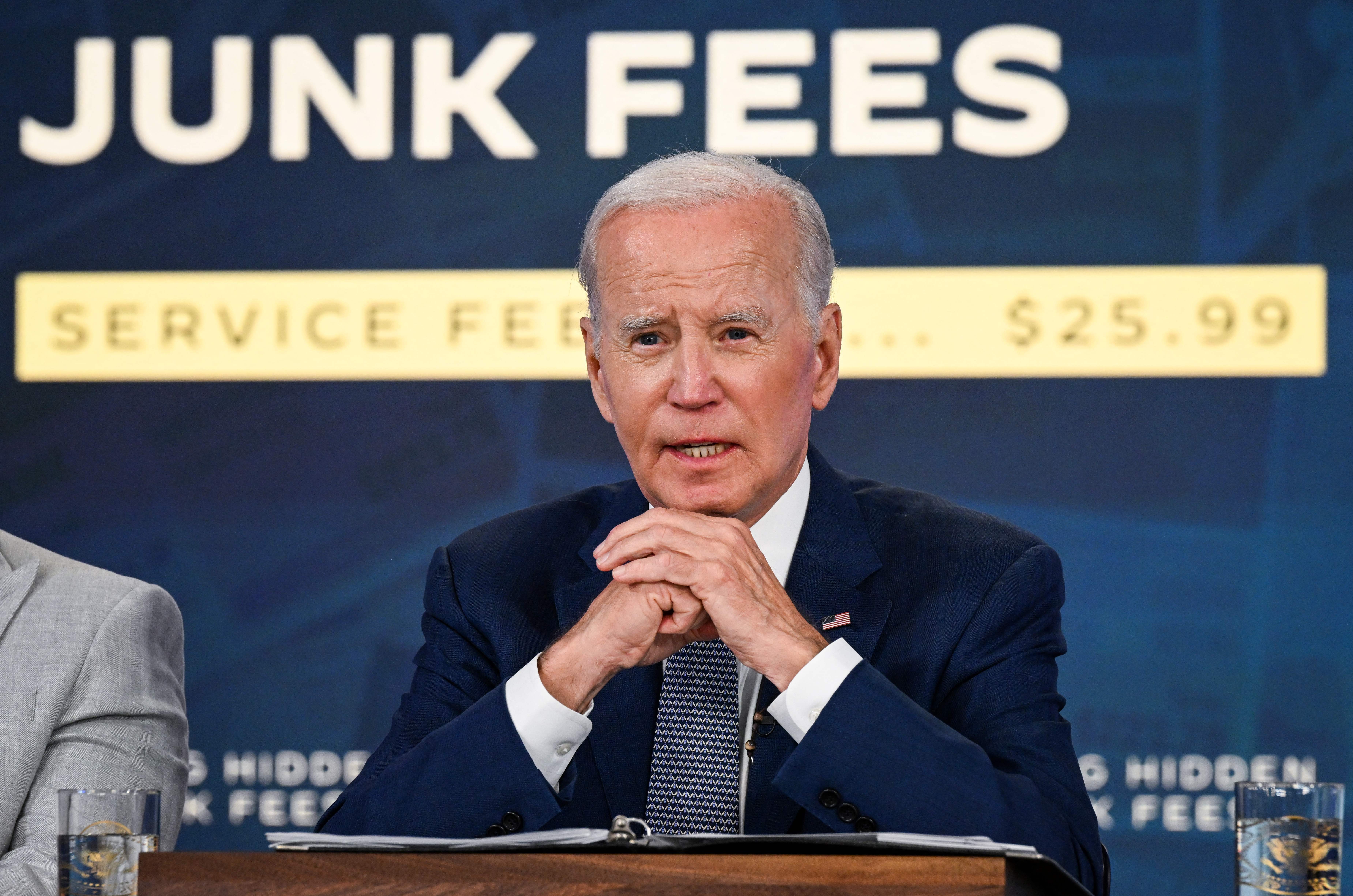 President Biden speaks about new measures to disclose hidden service fees alongside executives from companies that are vowing the end the practice. (AFP via Getty Images)