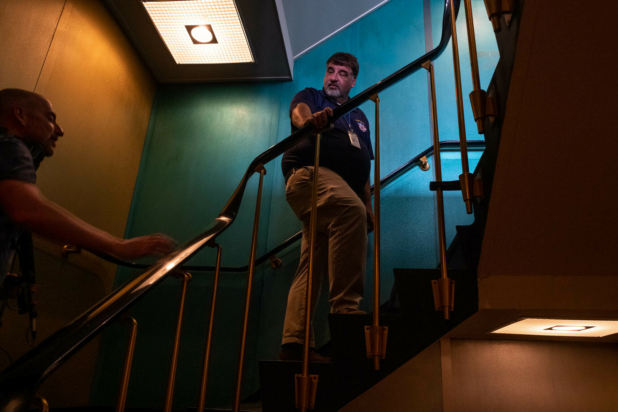 Step inside the world's only nuclear-powered passenger ship — built in 1959 3 Erhard Koehler, Senior Technical Advisor for the ship, climbs the passenger staircase from the lobby to the lounge area.