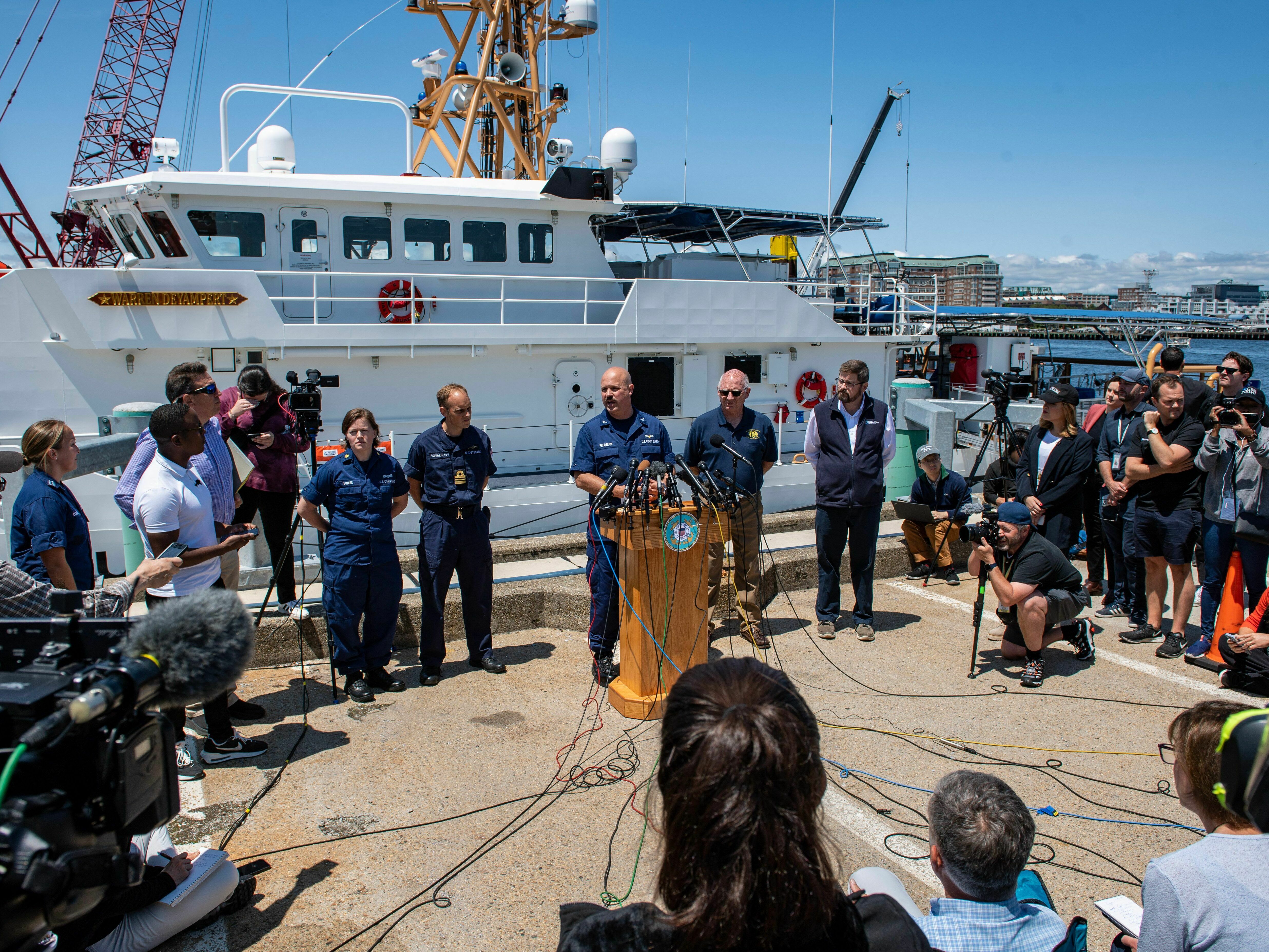 U.S. Coast Guard Capt. Jamie Frederick speaks to reporters about the search for the Titan submersible on Wednesday in Boston, Mass. (AFP via Getty Images)