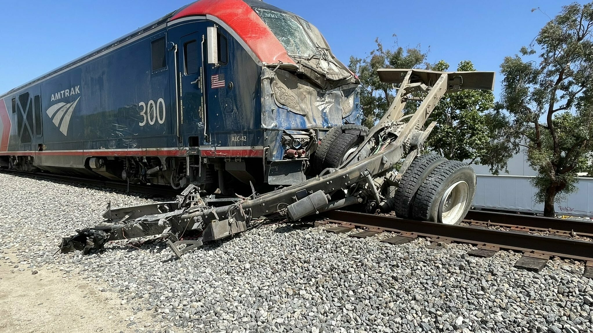 16 people are hospitalized after an Amtrak train crashes into a water truck