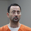 DOJ settles with Larry Nassar gymnastics victims : NPR 7 Disgraced USA Gymnastics doctor Larry Nassar is stabbed multiple times in prison