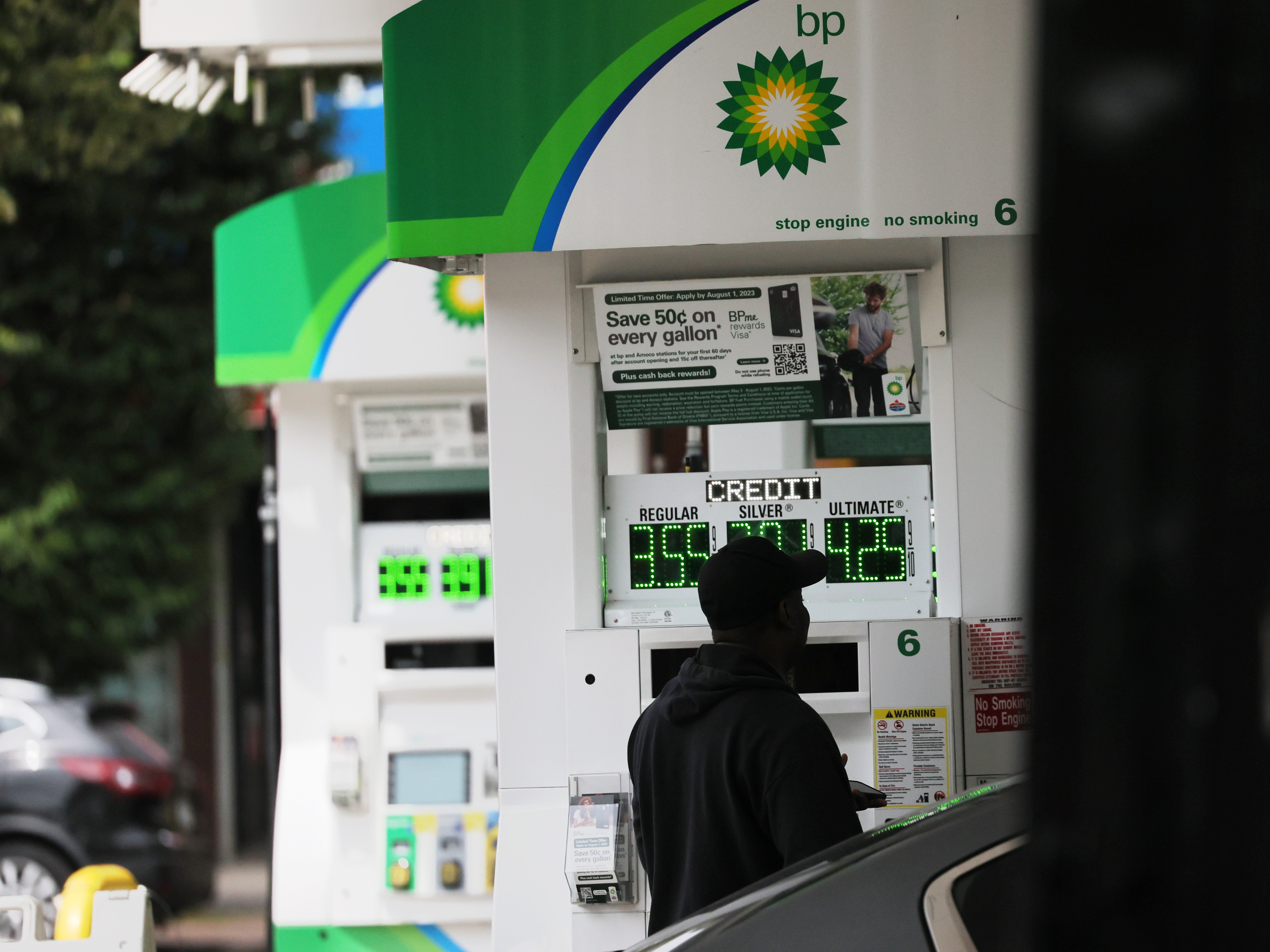 A person pumps gas at a BP gas station in Brooklyn, N.Y., on June 12. Annual inflation eased to 3% in June, the lowest in over two years, and there's hope that it could go lower. (Getty Images)