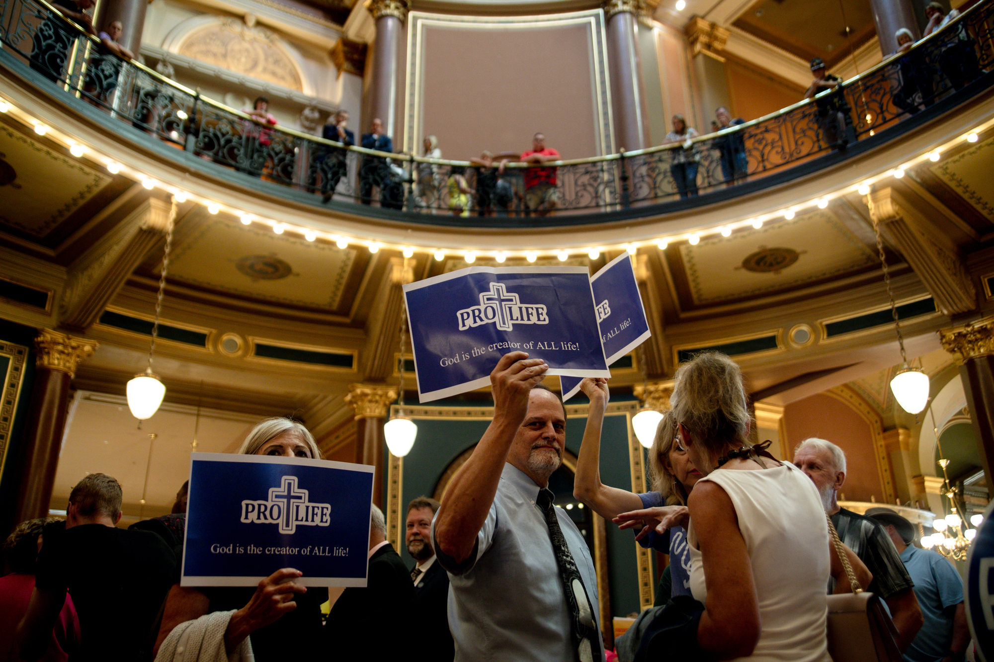 In a special legislative session that lasted around 15 hours, Republican lawmakers passed a &quot;fetal heartbeat&quot; bill that would effectively ban abortion after six weeks on Tuesday, July 11. Hundreds of Iowans rallied at the Capitol in protest and support of the legislation, clashing often in the building's rotunda. (Madeleine Charis King/IPR)