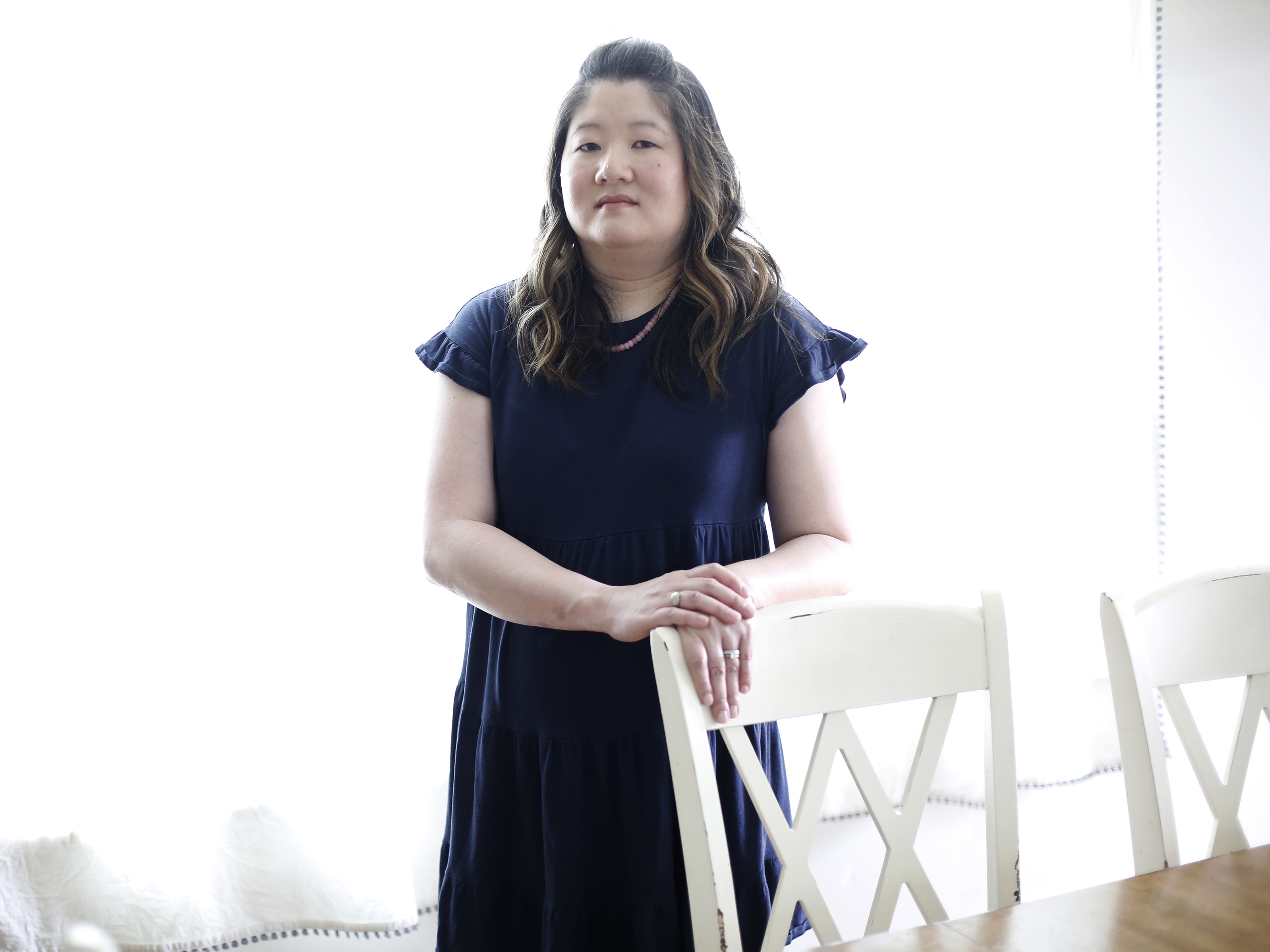 Bridget Narsh at her home in Chapel Hill, North Carolina. Narsh's son has autism, post-traumatic stress disorder, and ADHD. In 2020, he spent more than 100 days at Central Regional Hospital, a state-run mental health facility. The state billed the family nearly $102,000 for the hospitalizations. (KFF Health News)