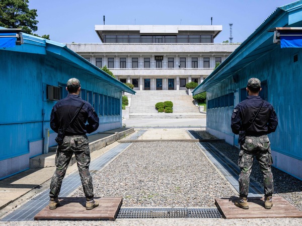 In this photo taken on May 9, South Korean soldiers stand guard as they face North Korea in the Joint Security Area of the Demilitarized Zone separating North and South Korea.