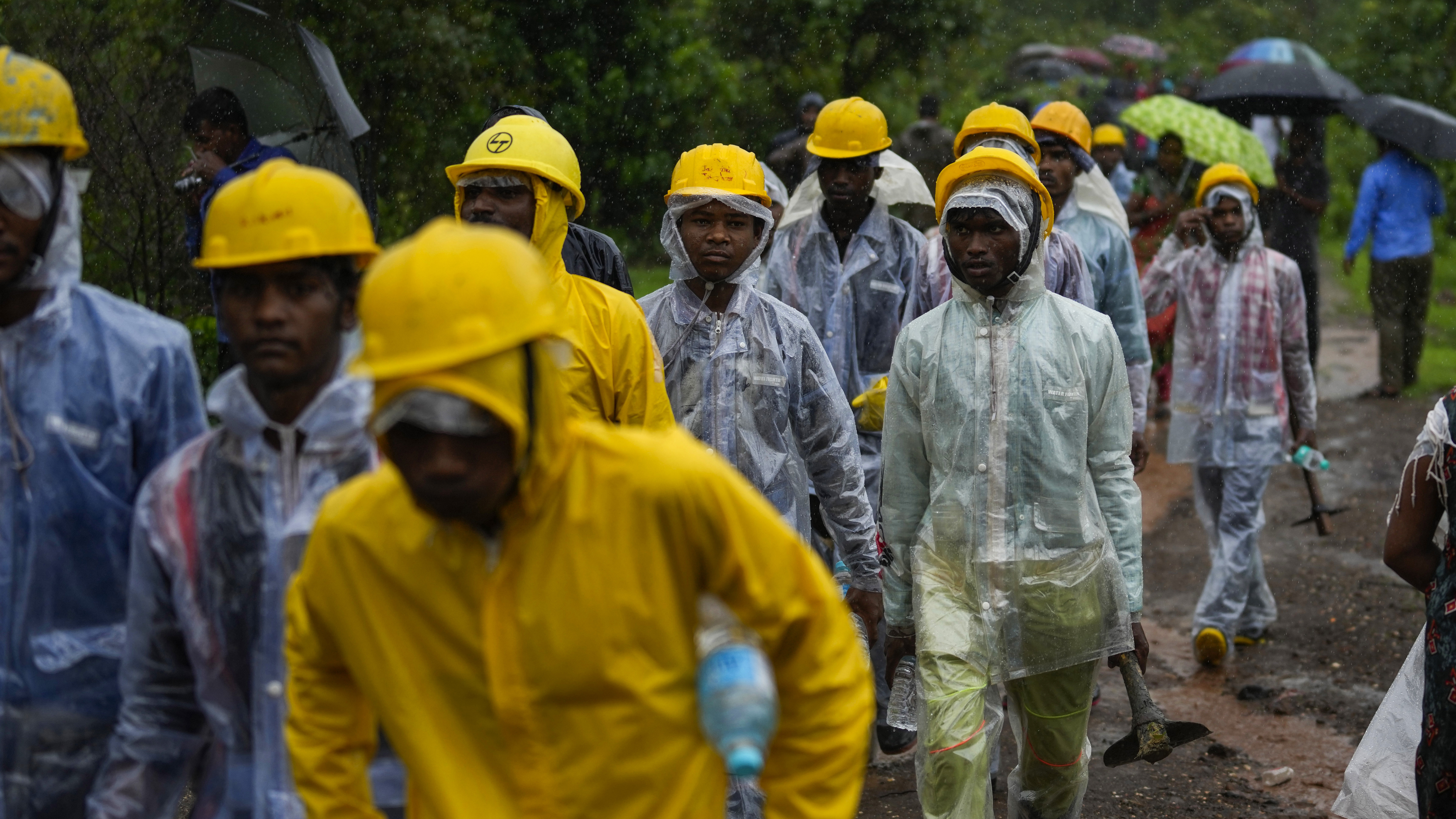 Indian rescuers find 27 dead and dozens are missing after rains cause landslide