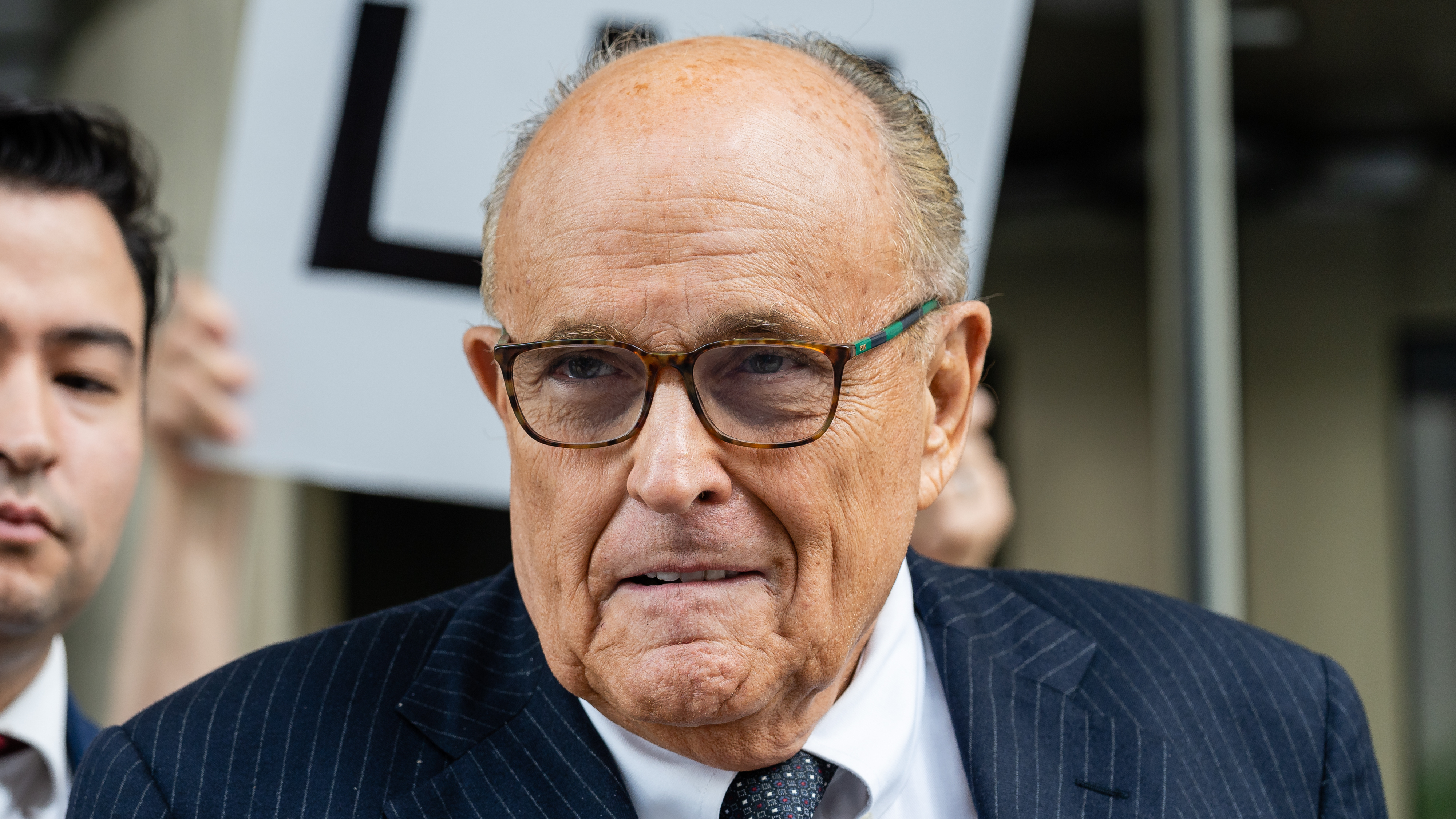Rudy Giuliani, former lawyer to Donald Trump, exits federal court in Washington, D.C., on May 19.