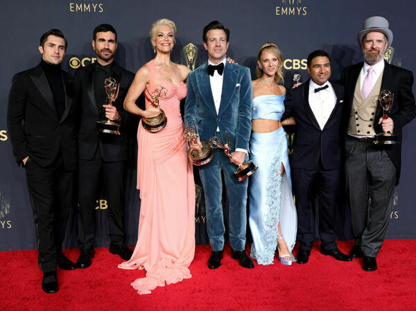 The cast of Ted Lasso pose during the 73rd Emmy Awards in 2021.