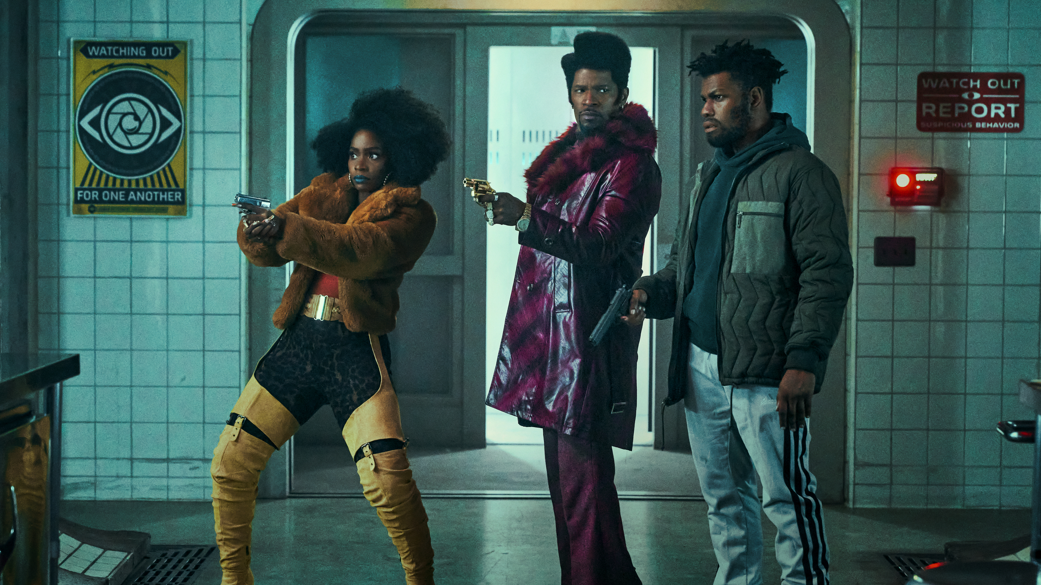 Up First briefing: Extreme heat and hospitals; Trump faces new charges; summer reads 2 Teyonah Parris as Yo-Yo, Jamie Foxx as Slick Charles and John Boyega as Fontaine in They Cloned Tyrone.
