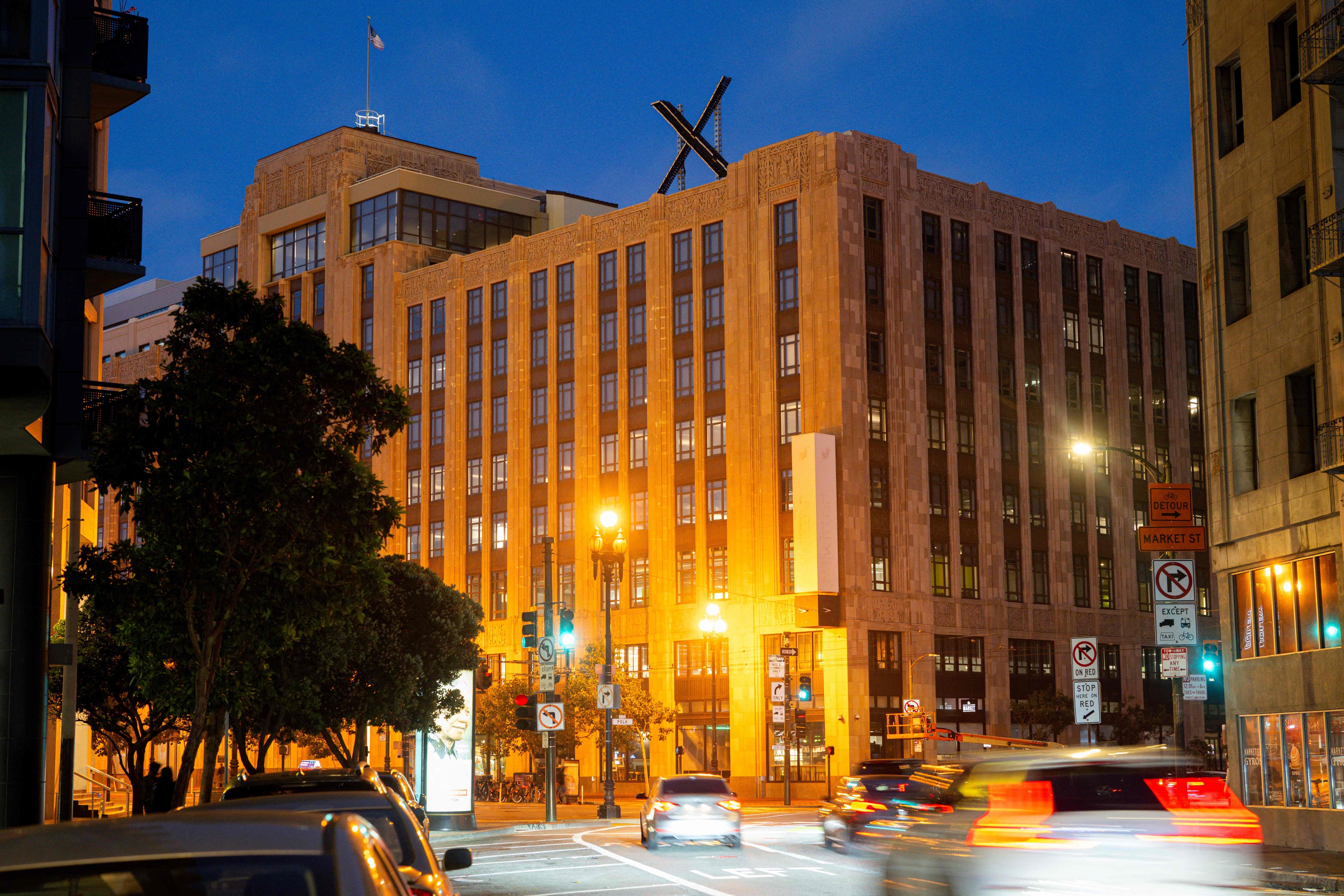 A newly constructed X sign is seen on the roof of the headquarters of the social media platform previously known as Twitter, in San Francisco, on July 29, 2023. Elon Musk killed off the Twitter logo on July 24, 2023, replacing the world-recognized blue bird with a white X. San Francisco city authorities forced the company to take down the sign right away for permitting reasons. (AFP via Getty Images)