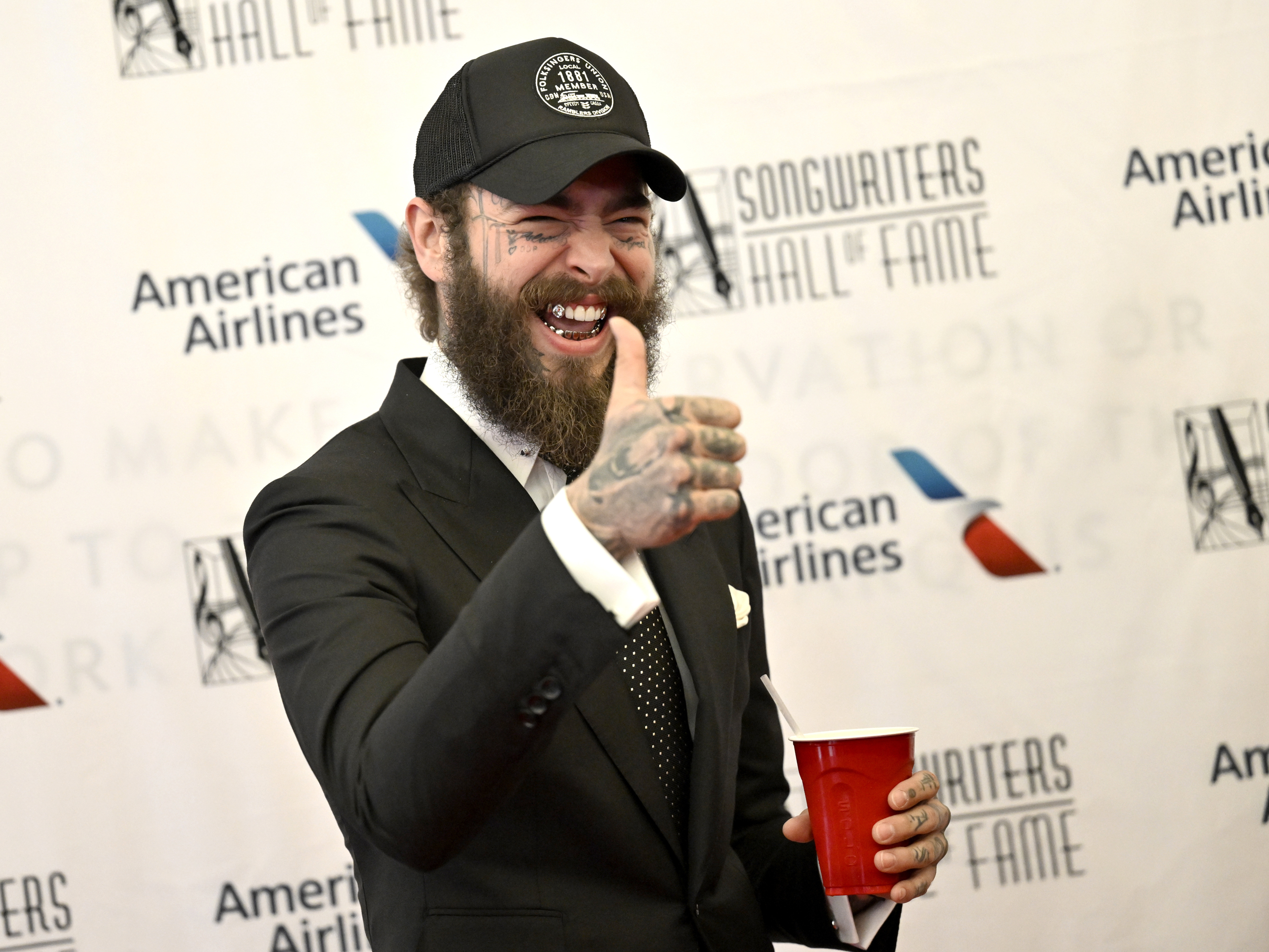 Post Malone bought MTG's 'One Ring' card : NPR Post Malone bought MTG's 'One Ring' card : NPR