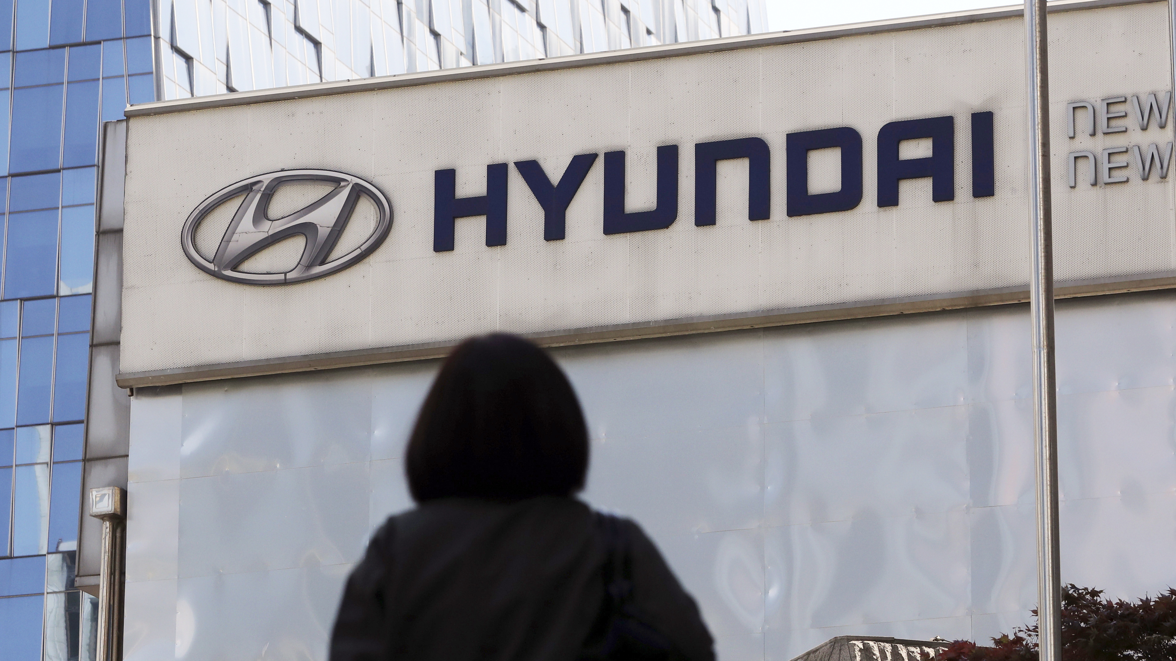 Over 52,000 Hyundai vehicles and 39,000 Kia cars in the U.S. are expected to be affected in the recalls. The logo of the Hyundai Motor Co. is displayed at the automaker