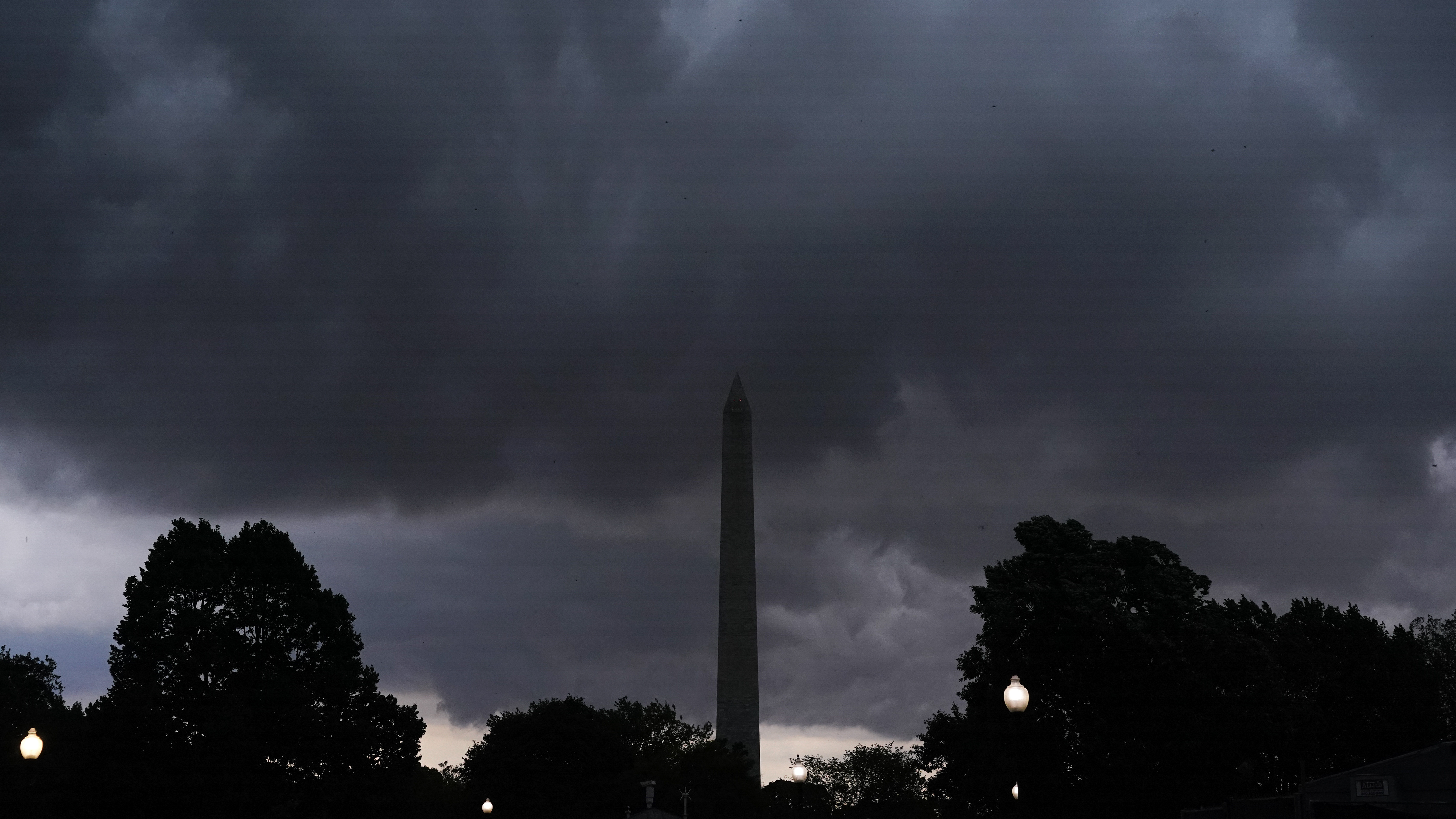 Powerful storms killed 2 people and left more than 1 million customers without power