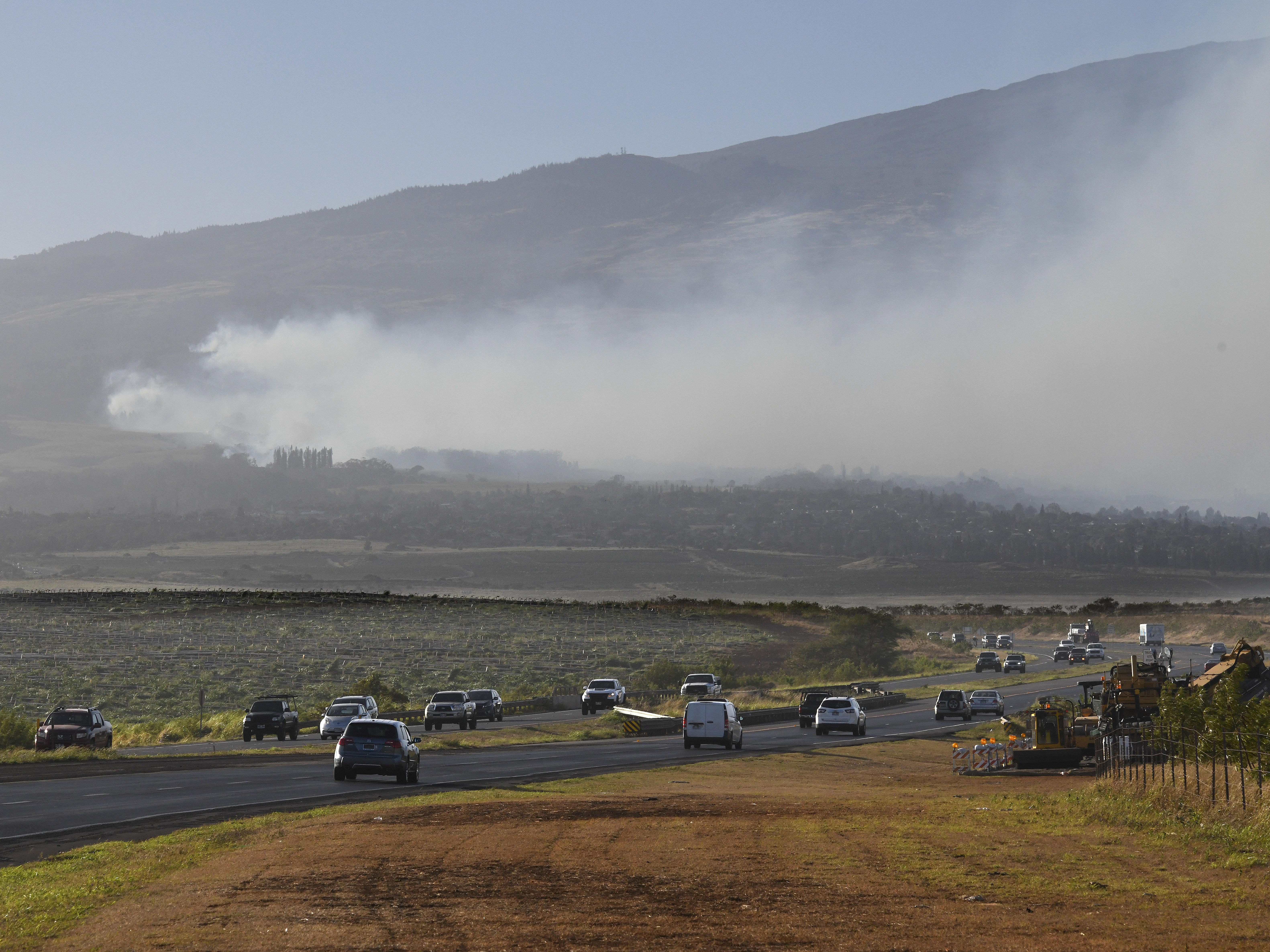 Wildfires across Hawaii burn homes, spurring evacuations and an emergency declaration