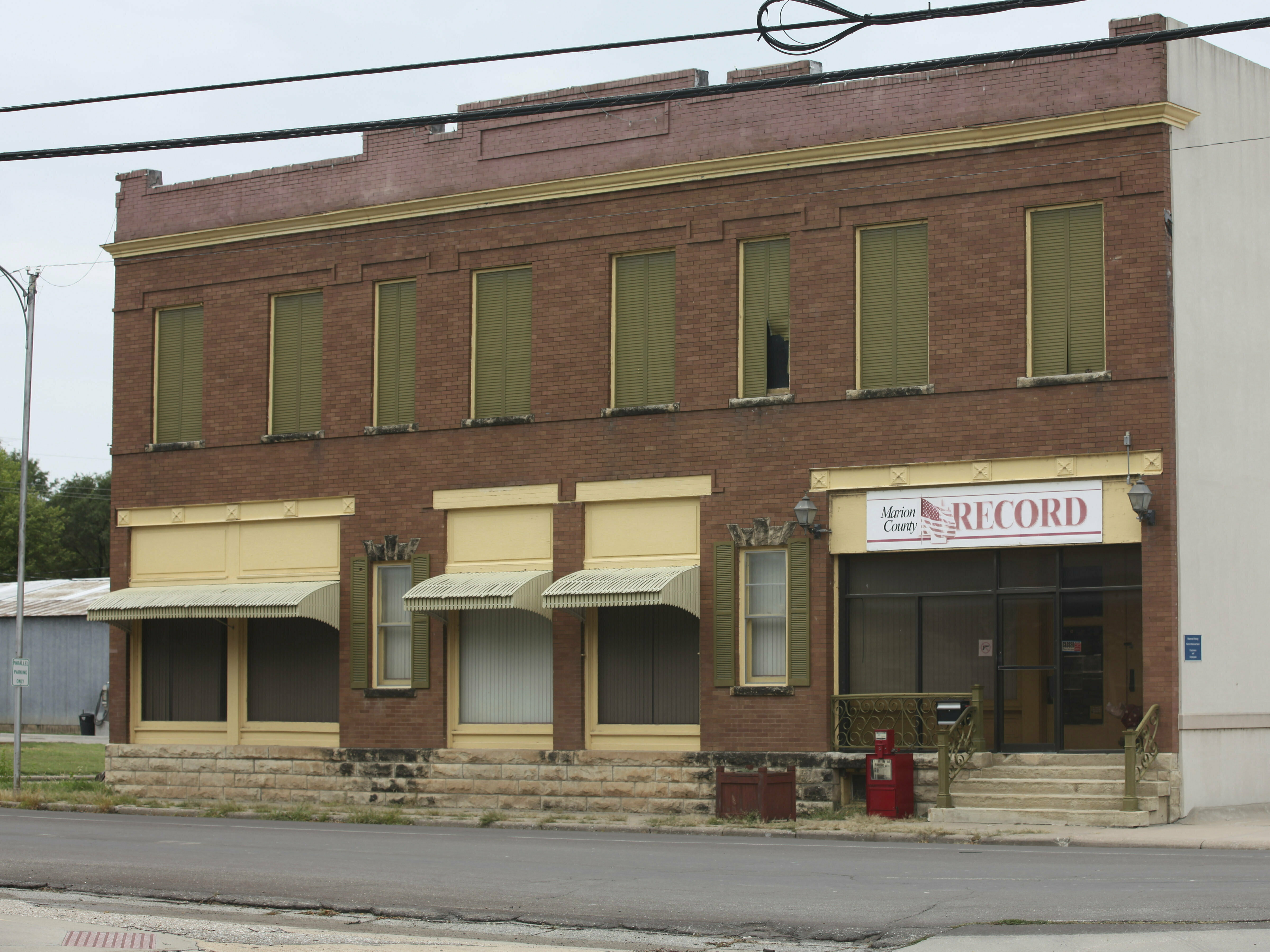 The offices of the Marion County Record sit across from the Marion County Courthouse in Marion, Kan., on Sunday.