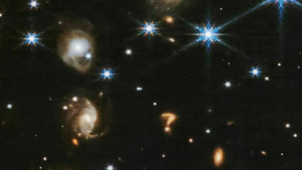 This James Webb Telescope image shows a question mark-shaped structure in deep space: NPR This James Webb Telescope image shows a question mark-shaped structure in deep space: NPR