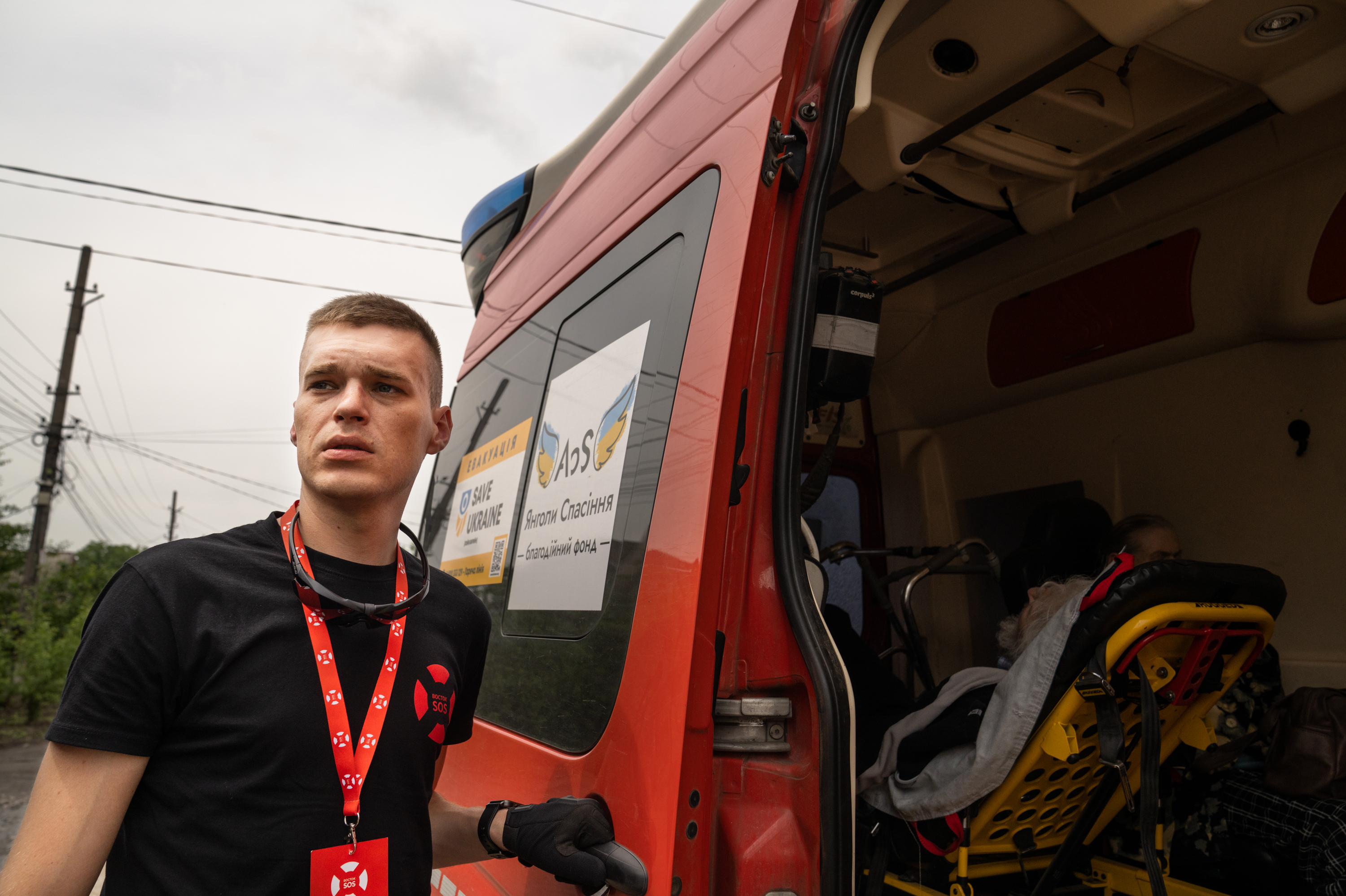 A Ukrainian rescue worker's memories are on pause as he evacuates people 3 Skoryk helps to transfer evacuees into a van. He left his hometown of Bakhmut about a year ago, just as the fighting there was intensifying. Shortly afterward, he began working with an emergency response team.