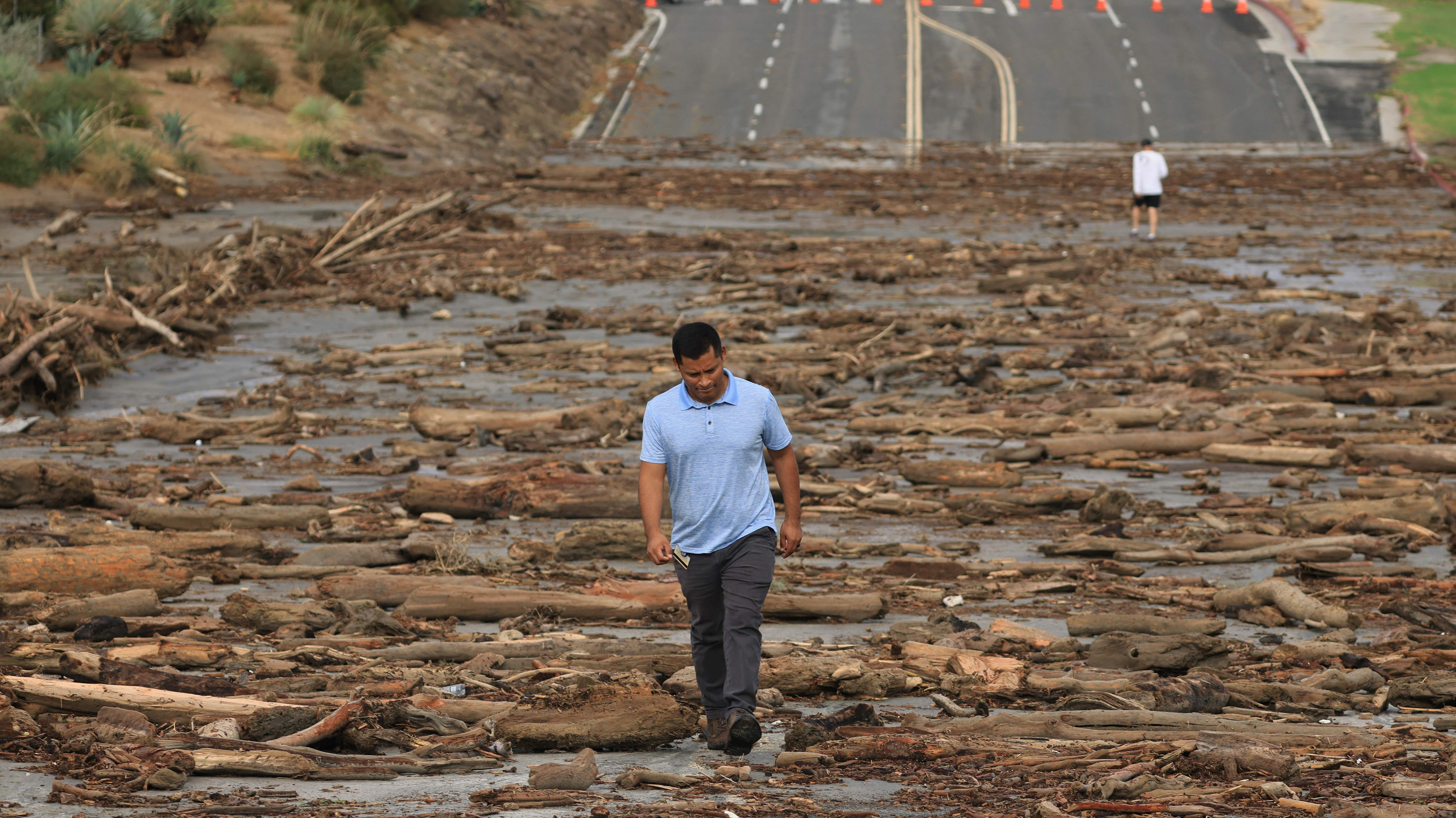 Tropical storm Hilary moves on from California, leaving a trail of damage of debris