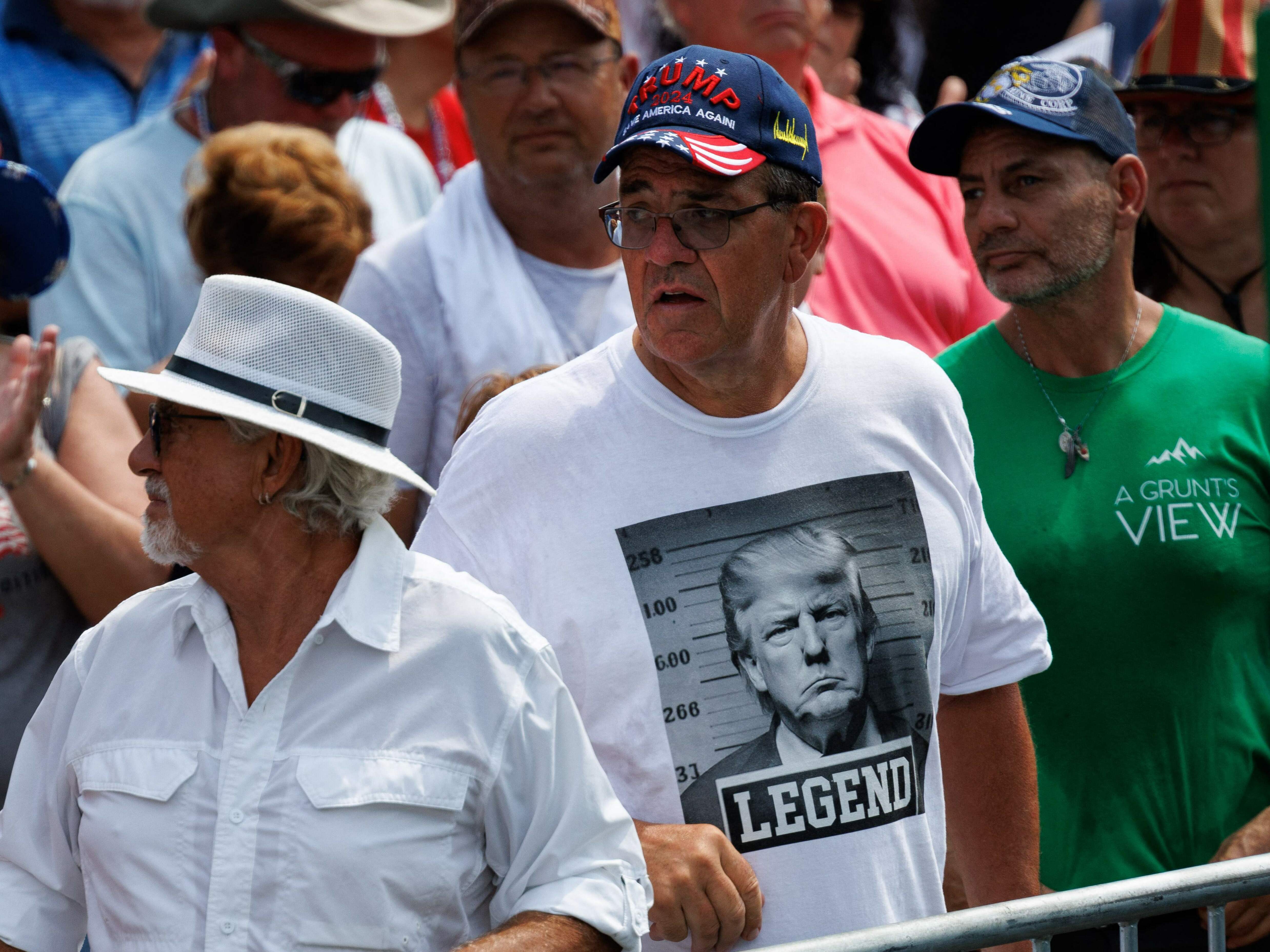 A shirt displaying a fake mug shot of the former president and 2024 presidential candidate Donald Trump is seen during a campaign rally in Pickens, S.C., in July. (AFP via Getty Images)