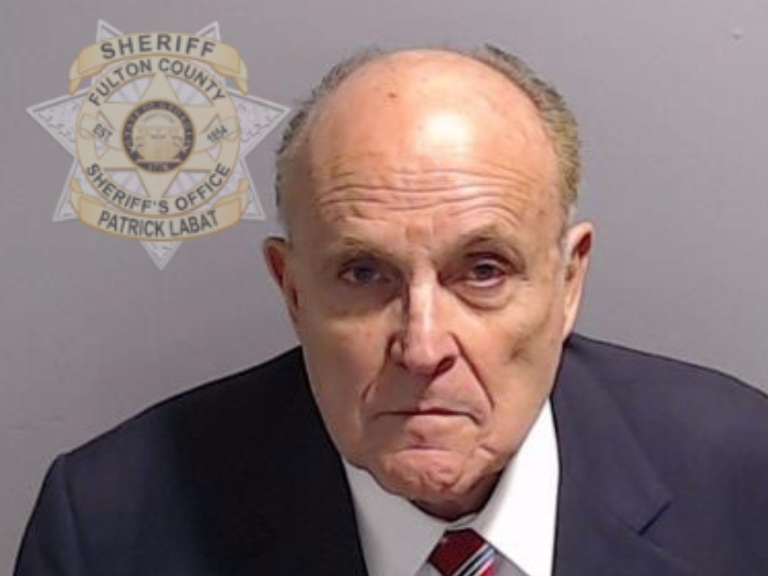 In this handout provided by the Fulton County Sheriff's Office, Rudy Giuliani, former personal lawyer for former President Donald Trump, poses for his booking photo on Aug. 23 in Atlanta. (Fulton County Sheriff's Office via Getty Images)
