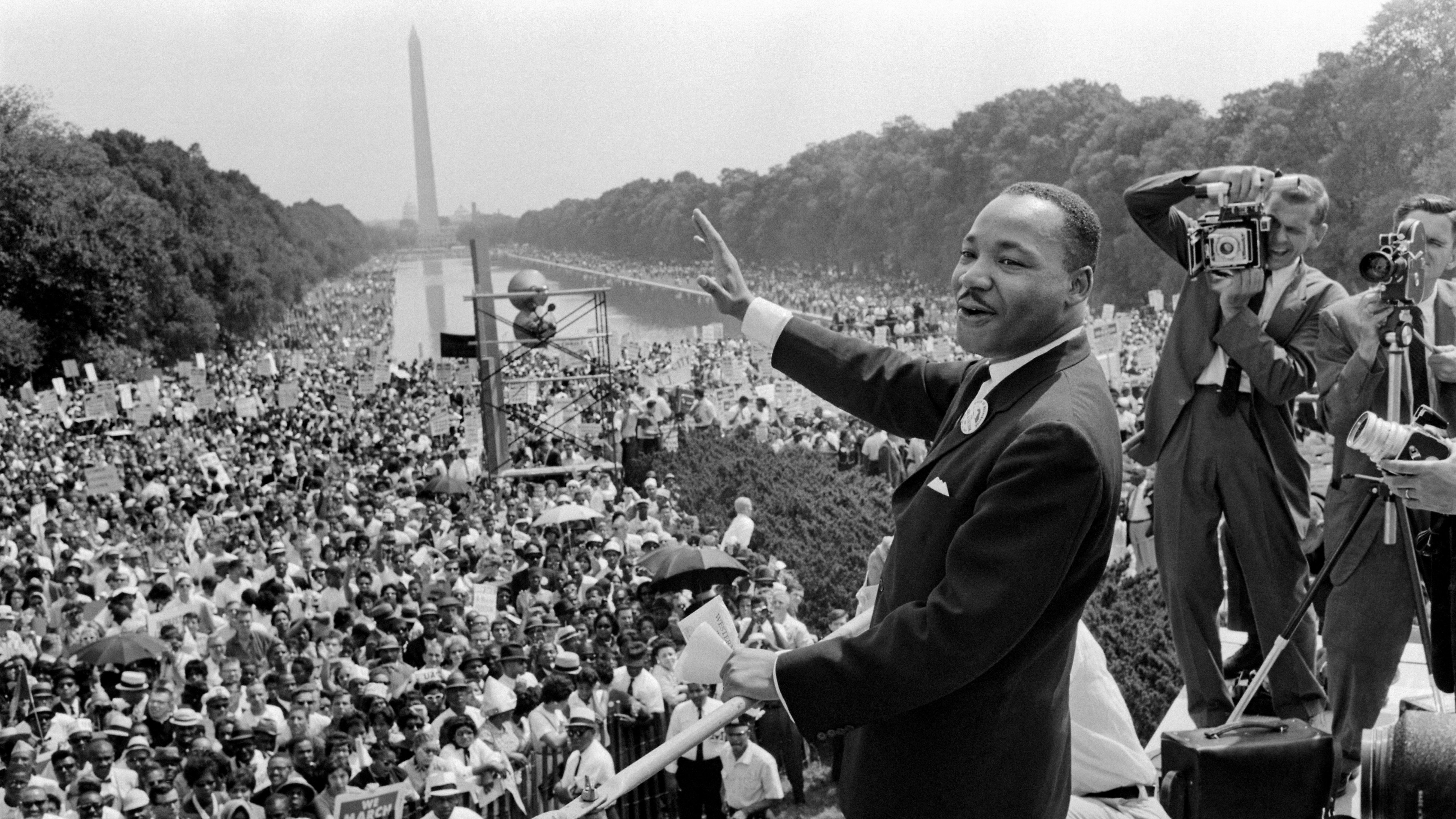 Martin Luther King Jr. waves to the crowd during the "March on Washington" in 1963.
