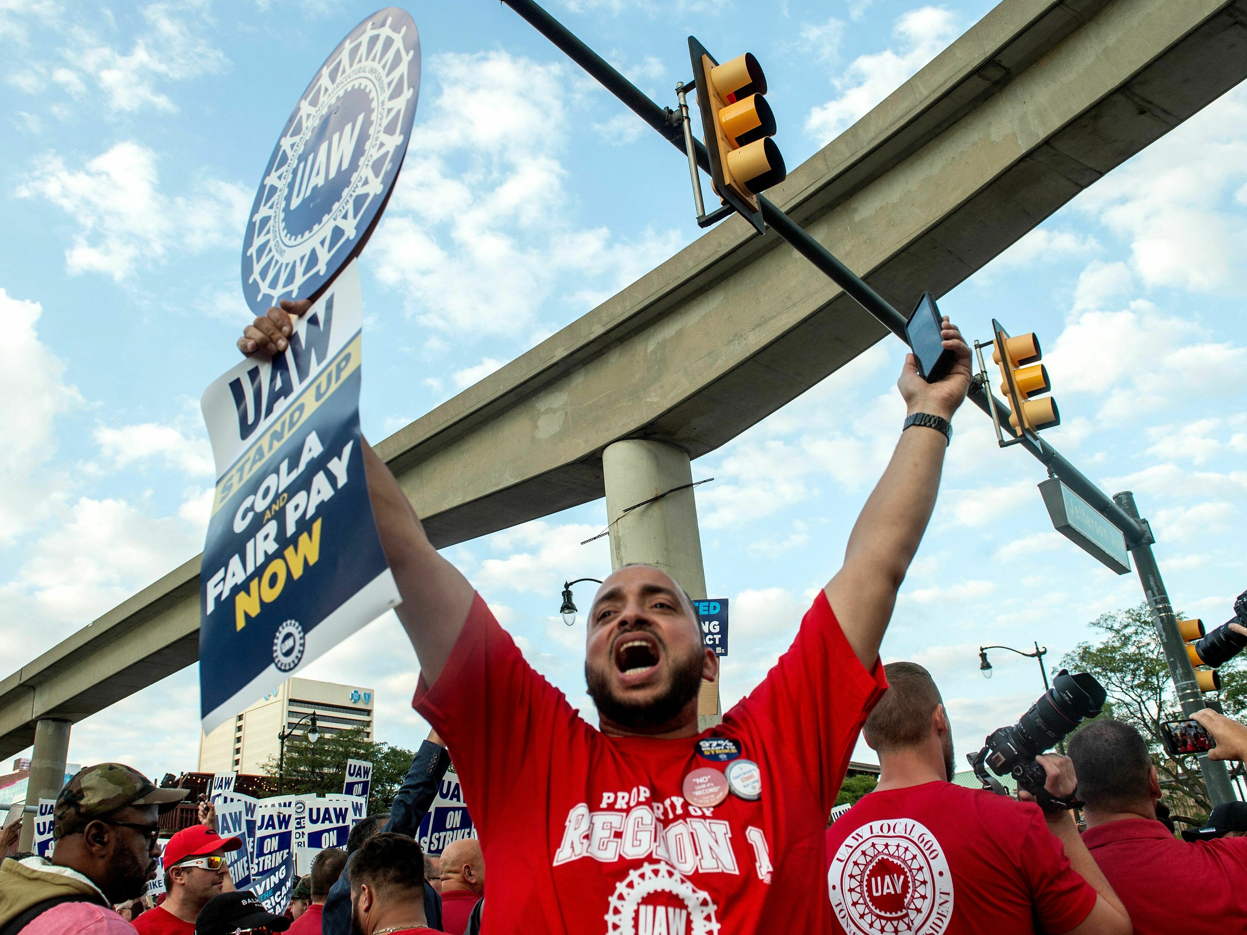 Members of the United Auto Workers (UAW) union march through the streets of downtown Detroit following a rally on the first day of the UAW strike in Detroit on Friday. Workers at the &quot;Big Three&quot; U.S. auto manufacturers went on strike on Sept. 15. (AFP via Getty Images)