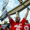 Auto workers want to 'play hardball' with unprecedented strike