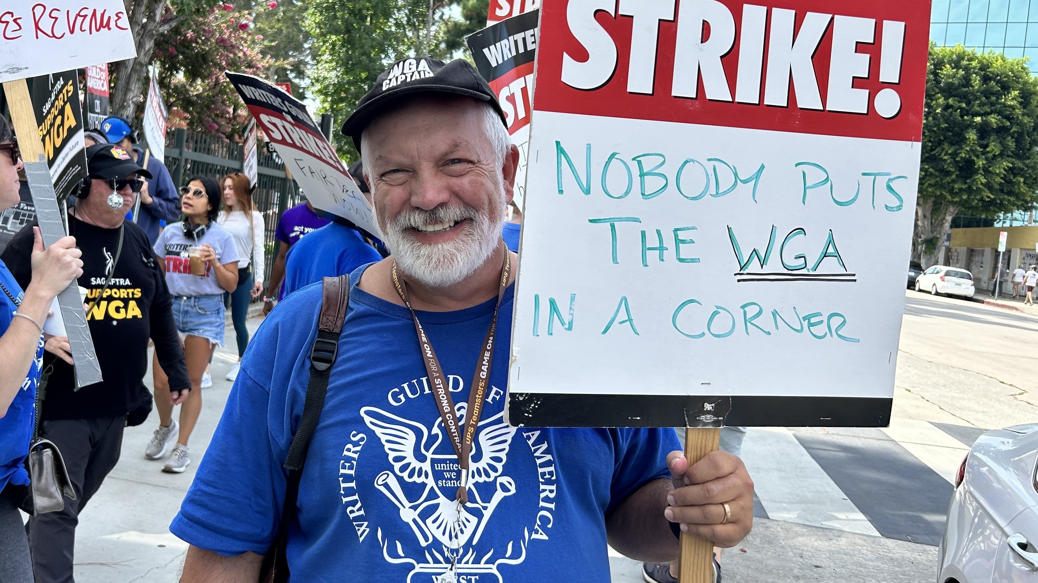 Brian Nelson has been a WGA member for 30 years. On the picket line outside CBS Radford Studios on Friday, The screenwriter said "whatever deal we make may be the template for other deals going forward."