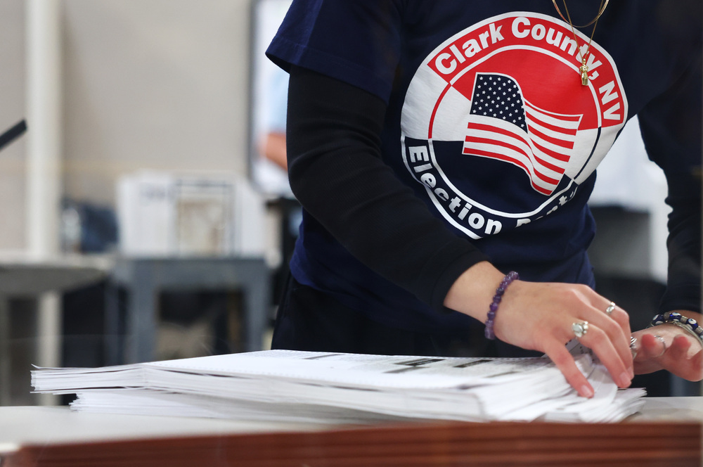 A Clark County Election Department worker sorts ballots on Nov. 9, 2022, in North Las Vegas, Nev. Nearly 60% of the state's county voting officials are new since 2020, according to a new report. (Getty Images)