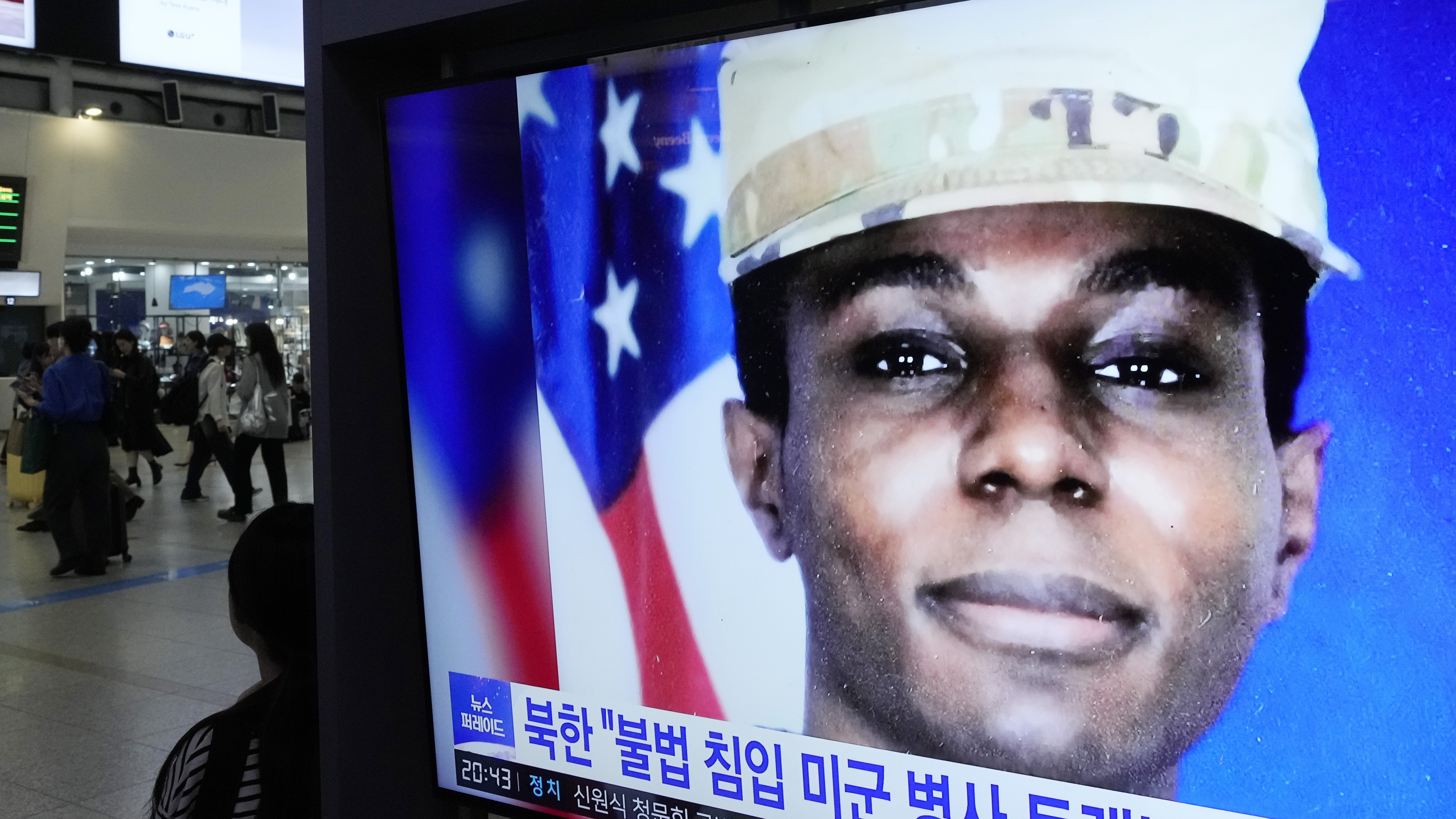 A TV screen shows a file image of U.S. soldier Travis King during a news program at the Seoul Railway Station in Seoul, South Korea, Wednesday. North Korea said Wednesday that it was expelling King, who crossed into the country through the heavily armed border between the Koreas in July.