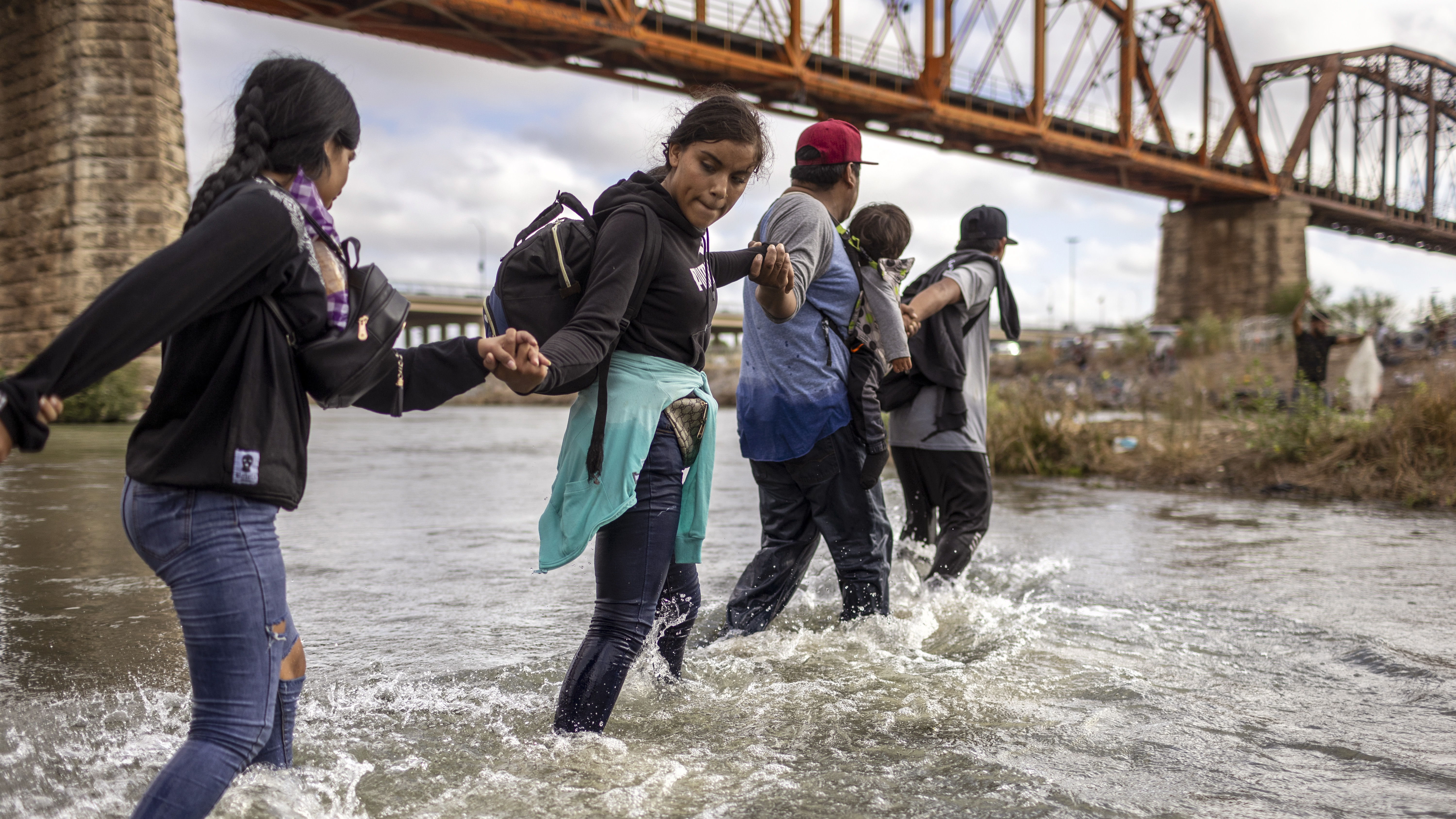 Immigrants from Venezuela crossed the Rio Grande from Mexico into the U.S. last month in Eagle Pass, Texas. (Getty Images)